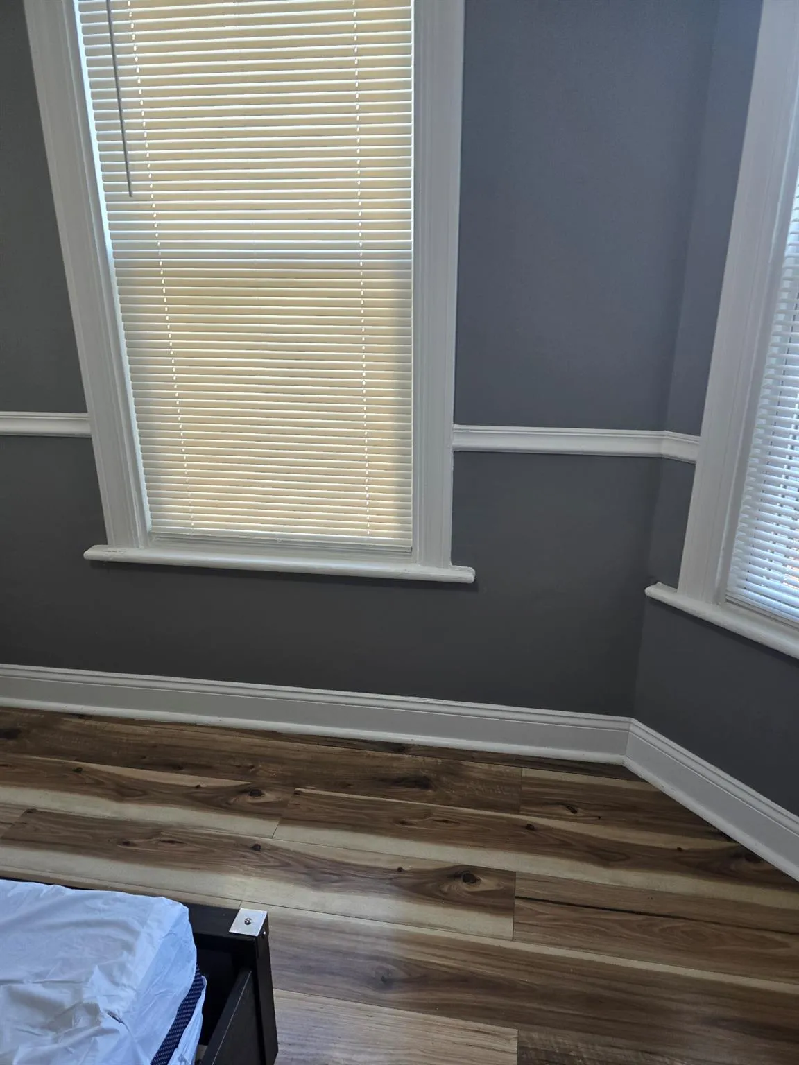 Detailed view of wood finished floors and baseboards Detailed view of wood finished floors and baseboards