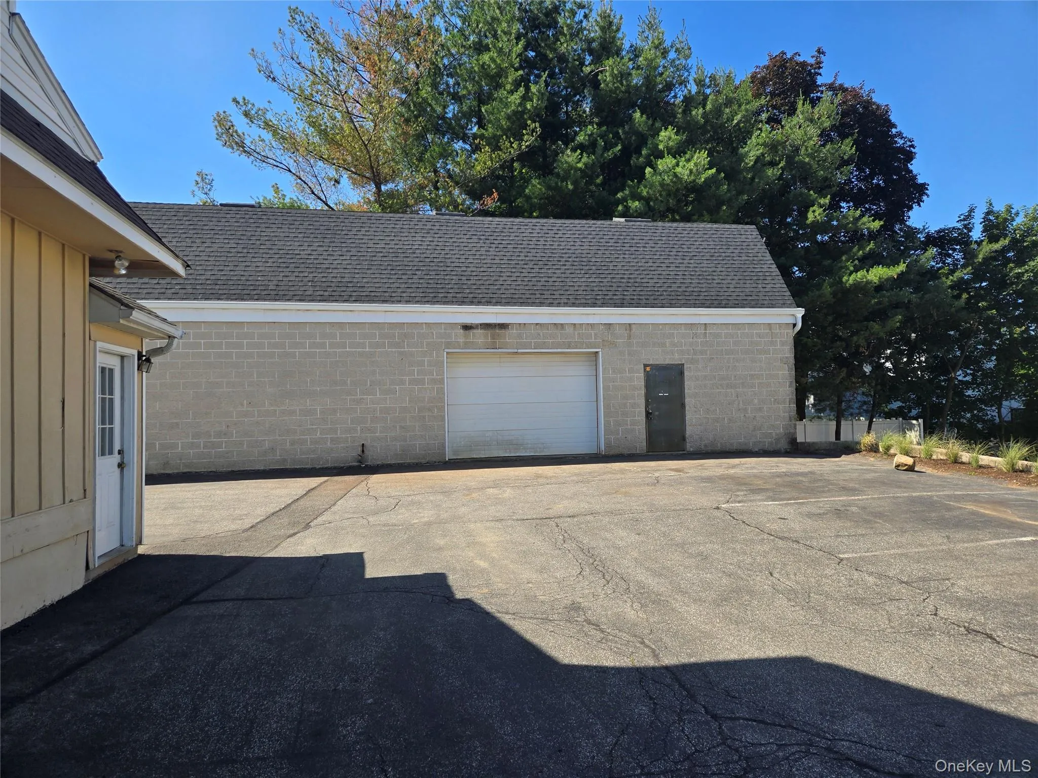 Garage with concrete driveway Garage with concrete driveway