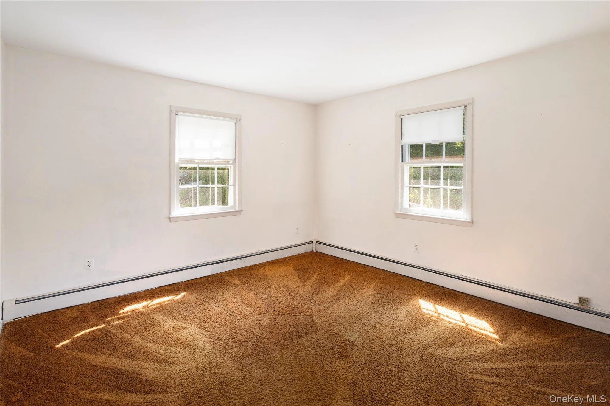 Bedroom 2 - Wood floors underneath carpet. Bedroom 2 - Wood floors underneath carpet.