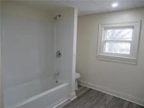 Full bathroom with shower / bathtub combination picture when apt vacant Full bathroom with shower / bathtub combination picture when apt vacant