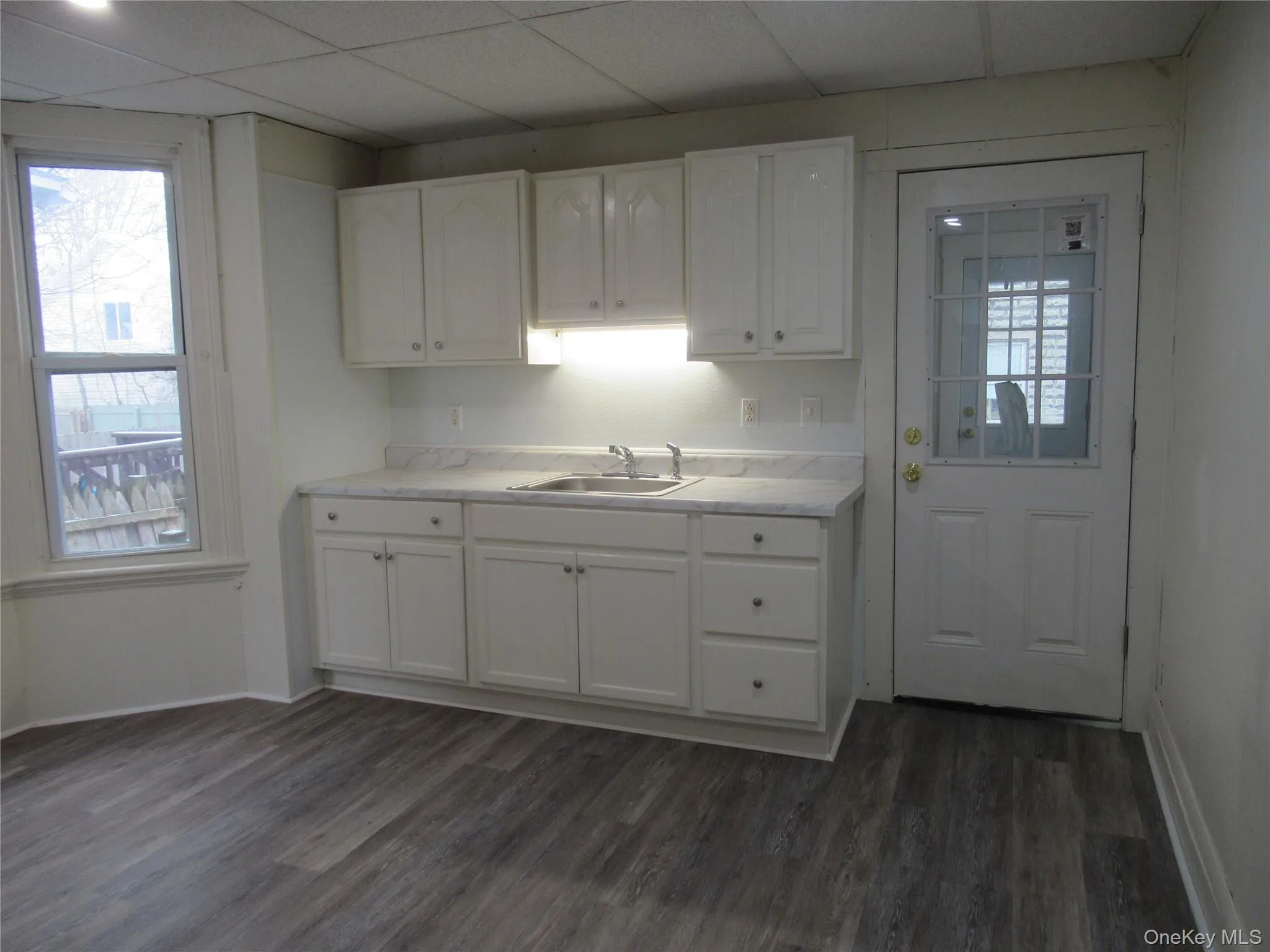 Kitchen door to laundry w/dryer hookup. Kitchen door to laundry w/dryer hookup.