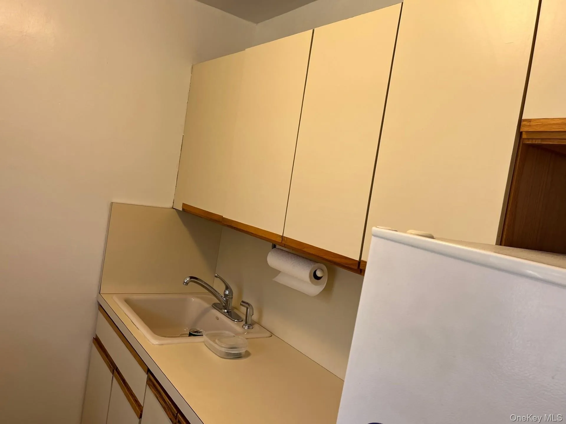 Refrigerator, Cabinets, counter and sink Refrigerator, Cabinets, counter and sink