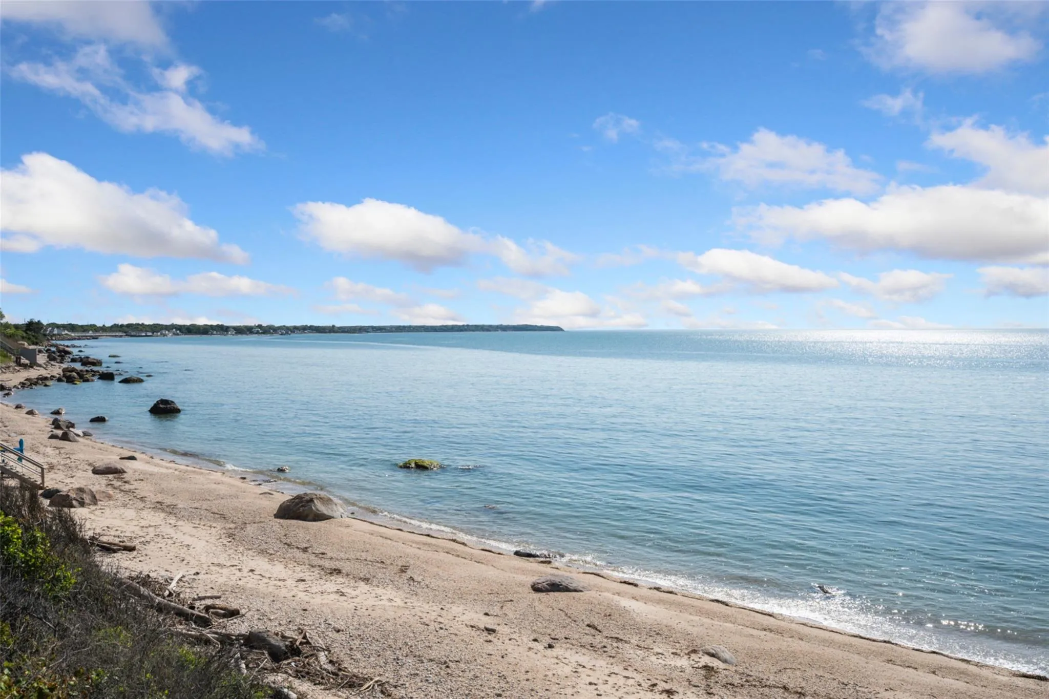 Water view featuring nearby beach Water view featuring nearby beach