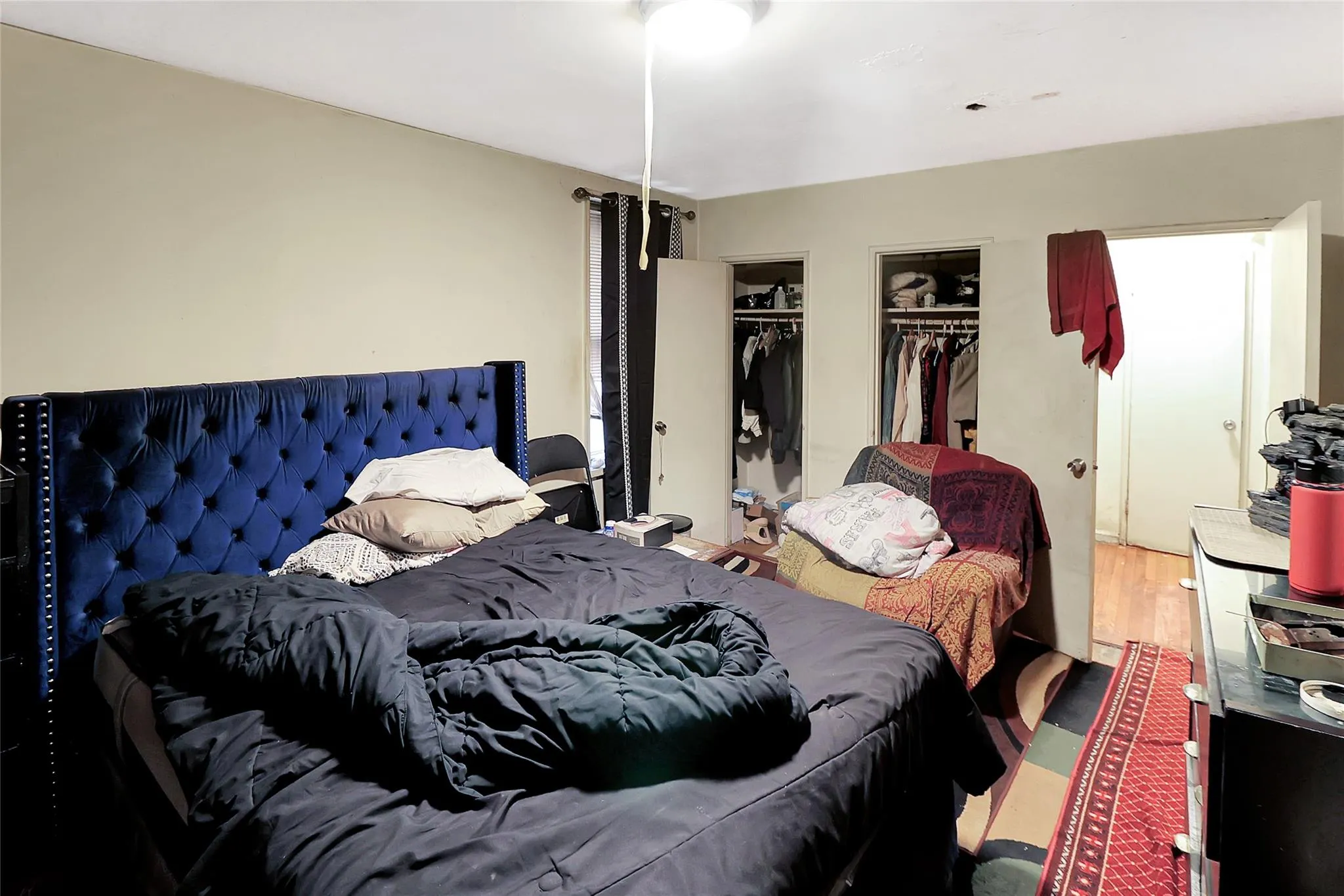 Bedroom with wood finished floors Bedroom with wood finished floors