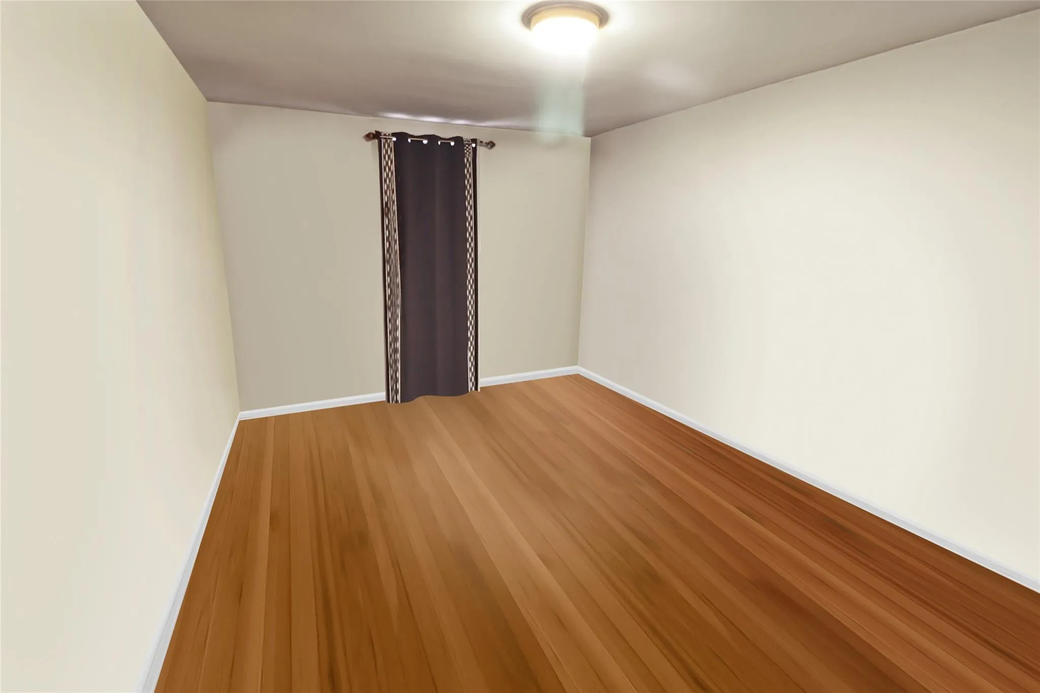 Empty room with light wood finished floors Empty room with light wood finished floors