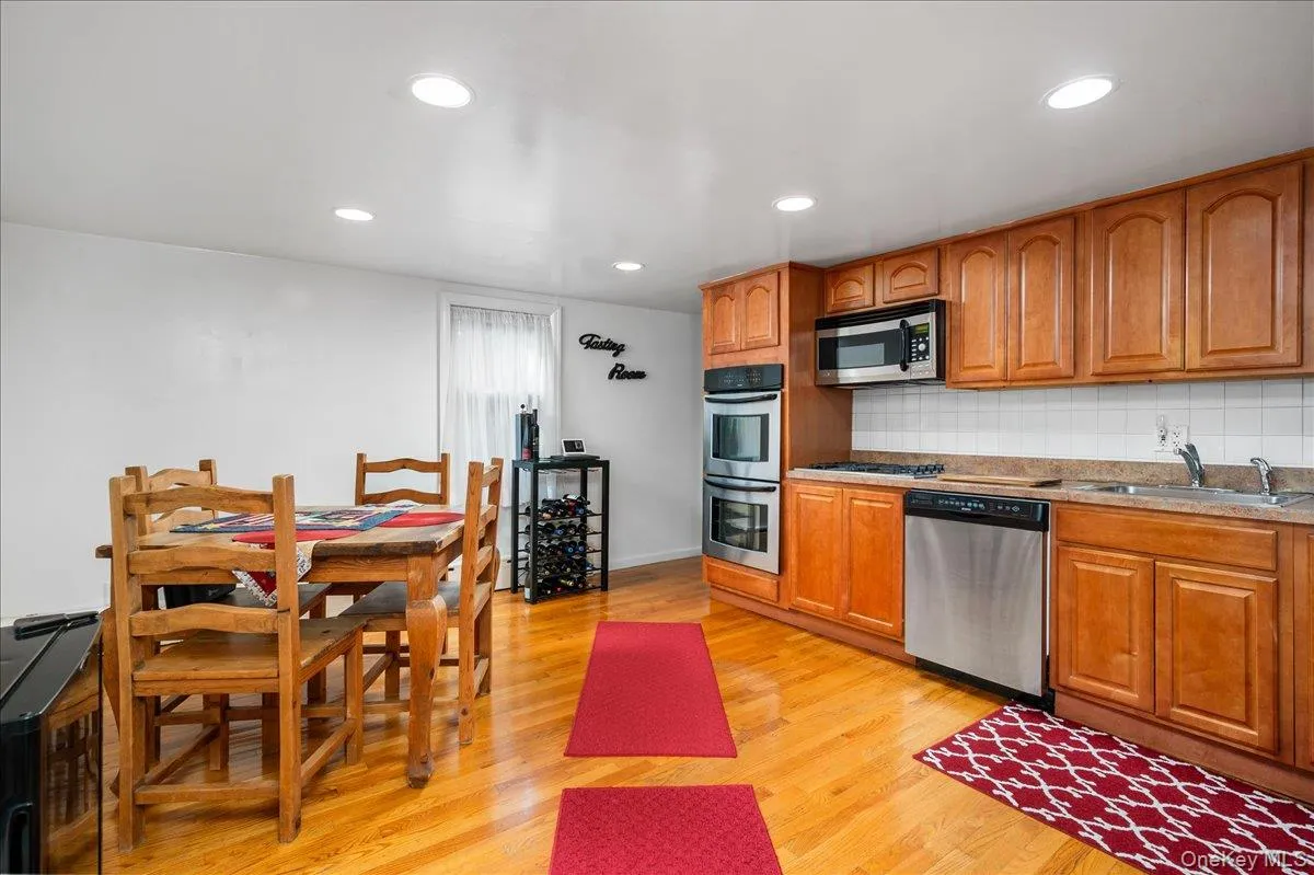 Kitchen from different view. Convenient dining area. Kitchen from different view. Convenient dining area.