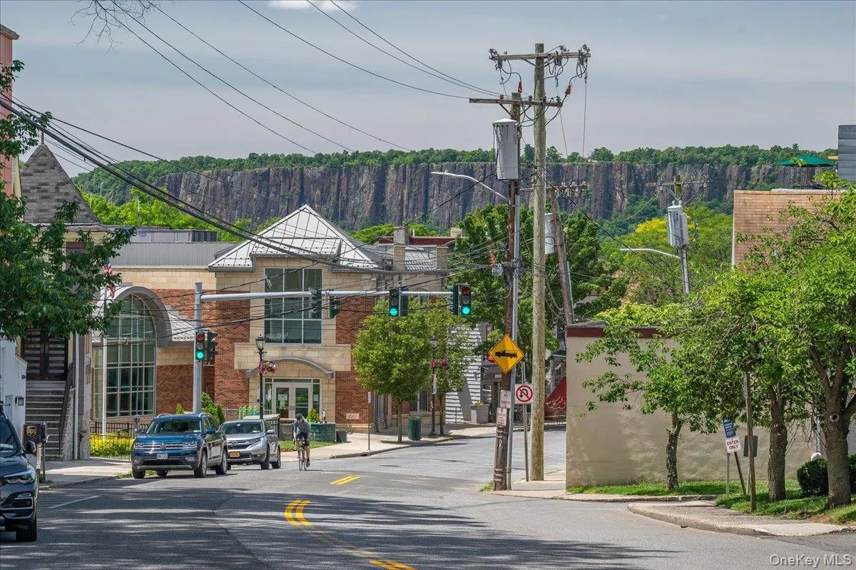 Main Street with Community Center in foreground and Palisades in the distance. Main Street with Community Center in foreground and Palisades in the distance.