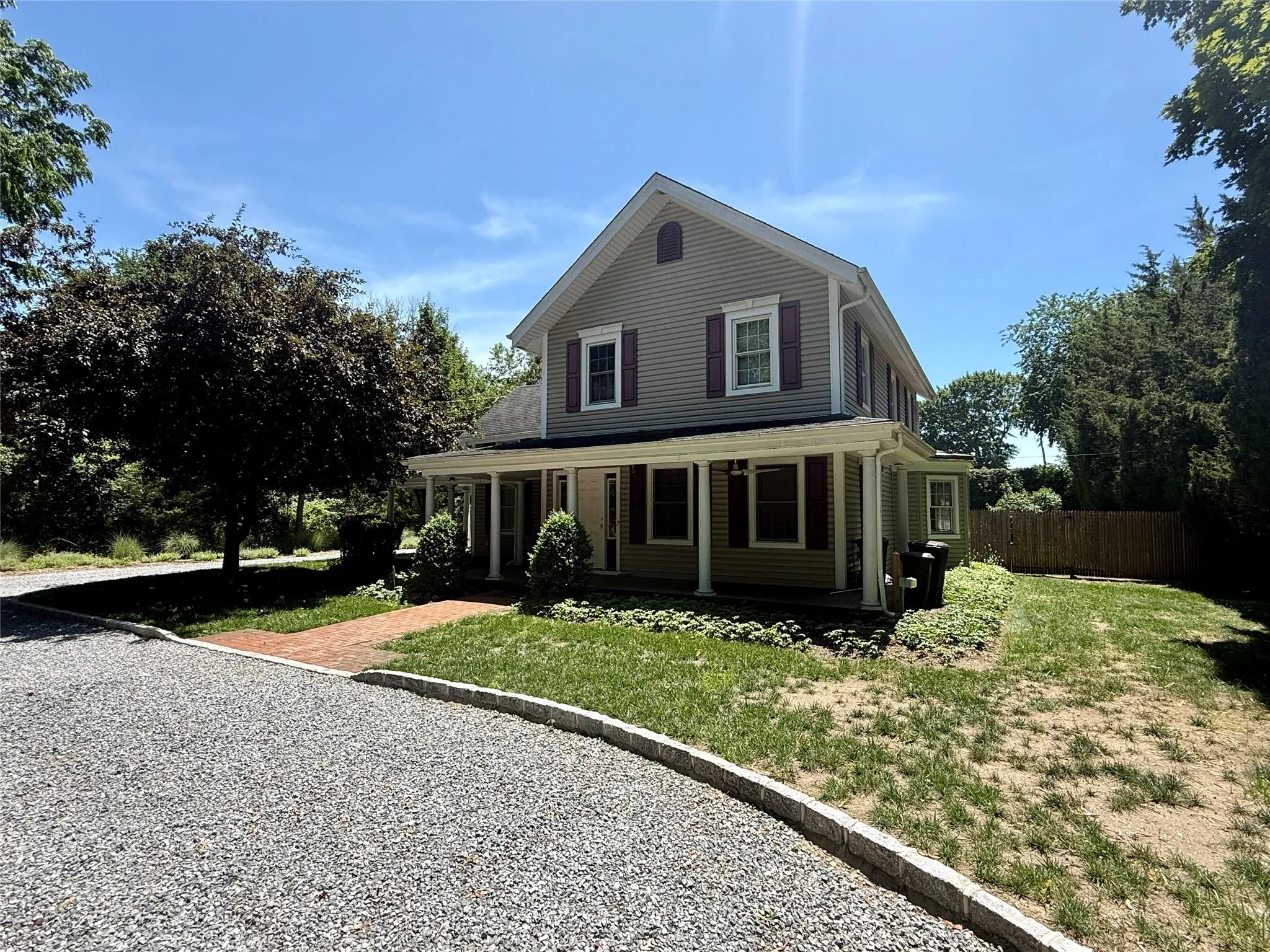 Country-style home with a porch Country-style home with a porch