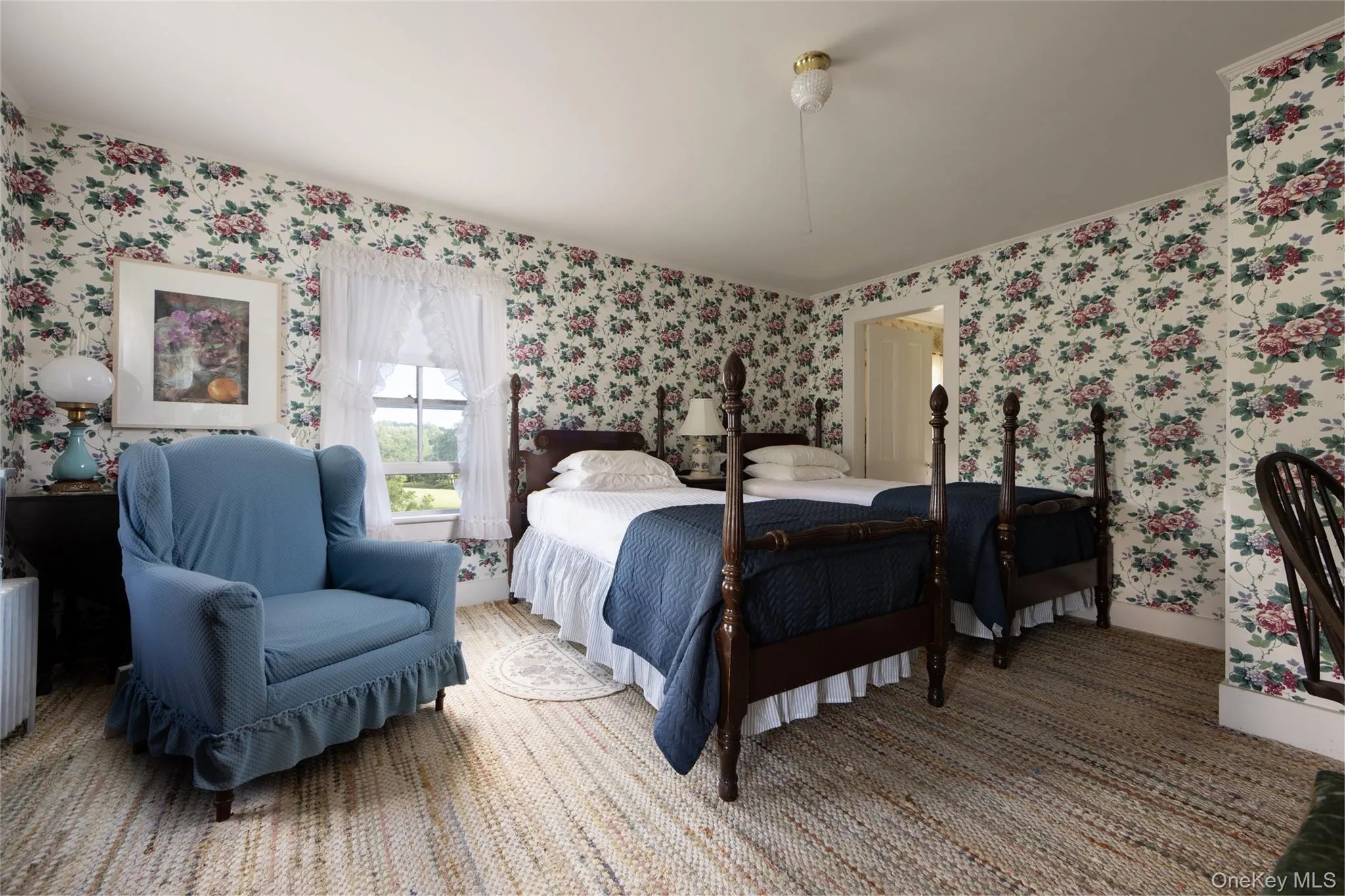 Bedroom with wallpapered walls Bedroom with wallpapered walls