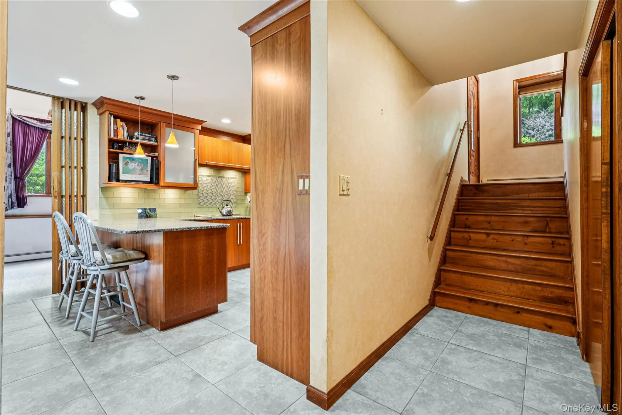 Just a few stairs down to the main level. Just a few stairs down to the main level.