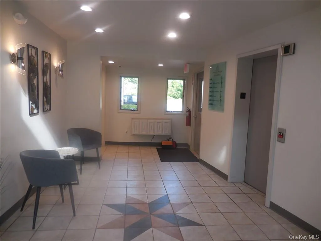 Lobby of the building with the elevator. Lobby of the building with the elevator.
