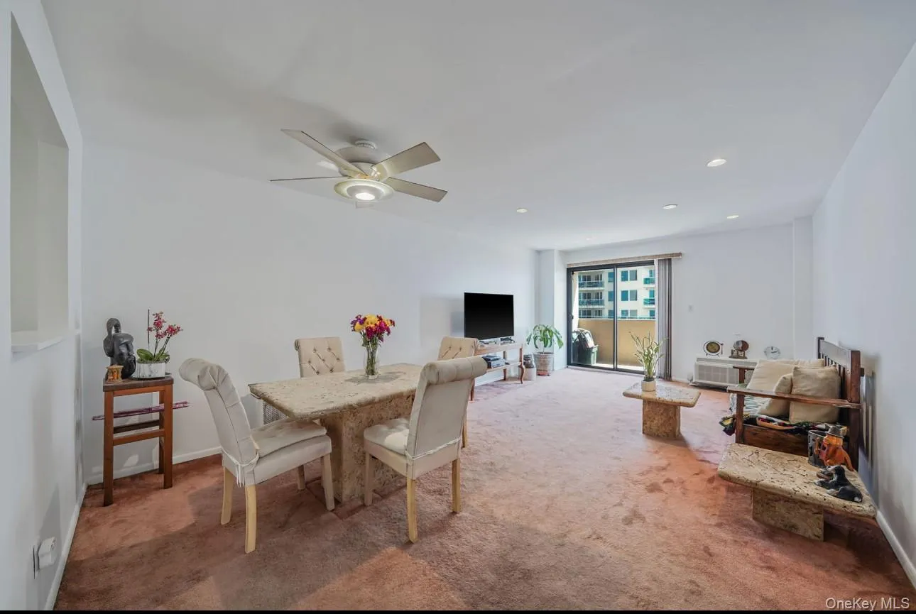 Carpeted dining space featuring recessed lighting and ceiling fan Carpeted dining space featuring recessed lighting and ceiling fan