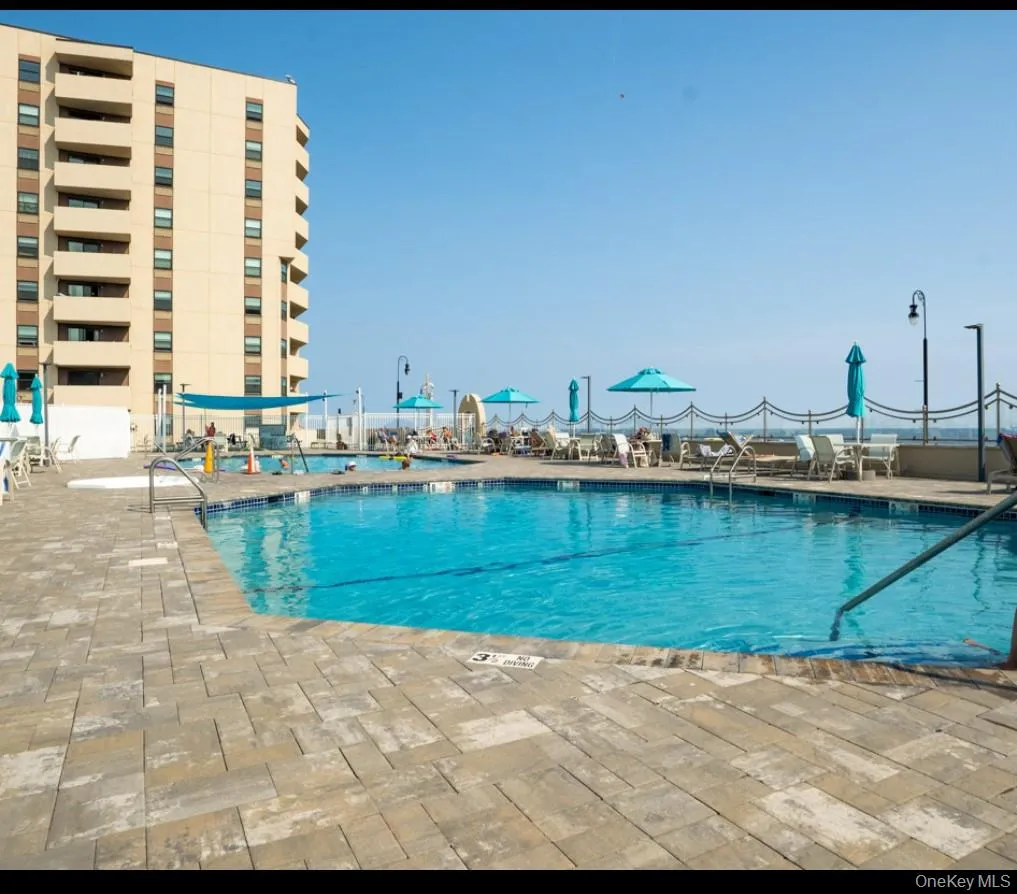 Community pool featuring a patio Community pool featuring a patio