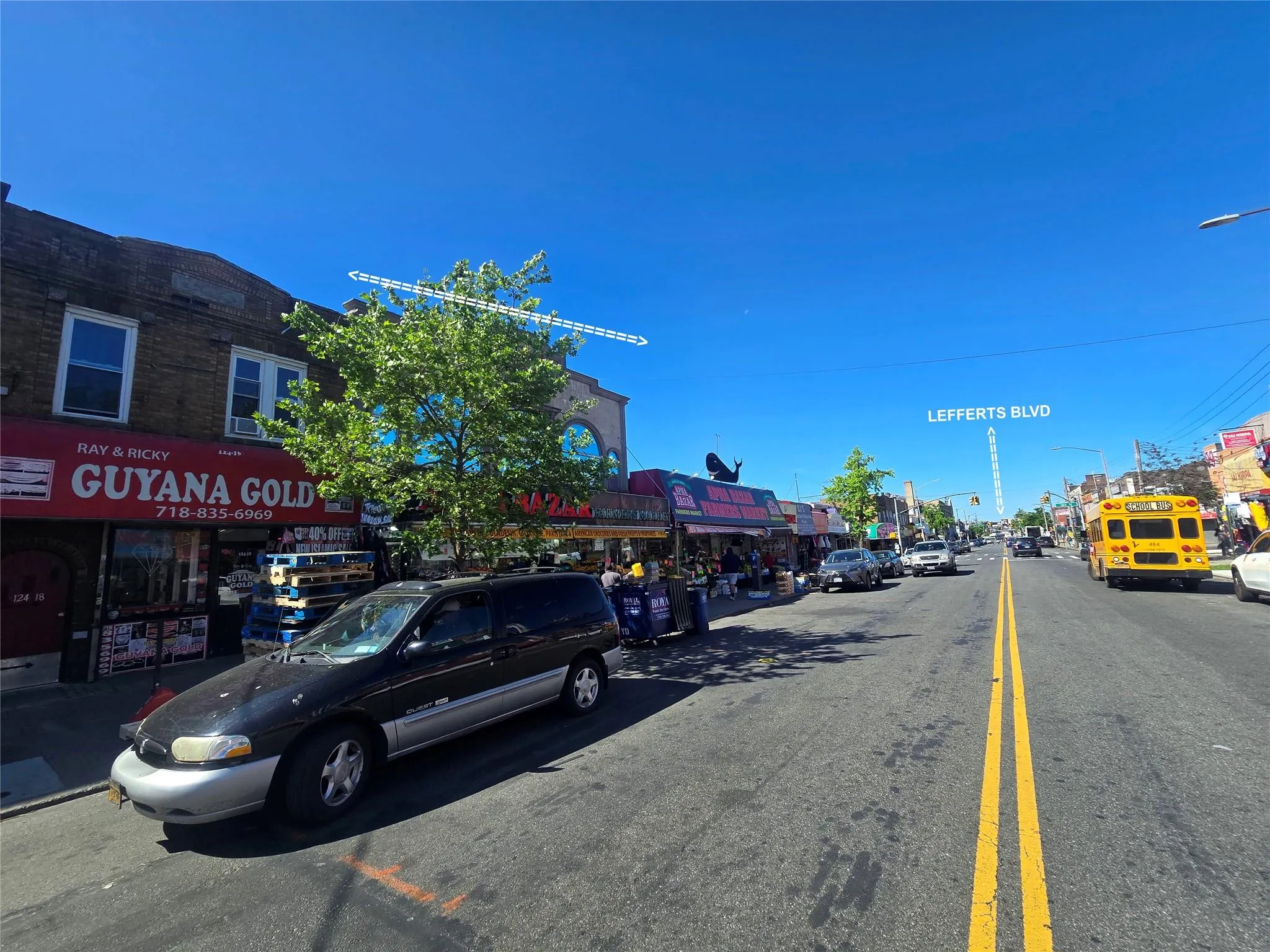 View of asphalt road with street lighting View of asphalt road with street lighting