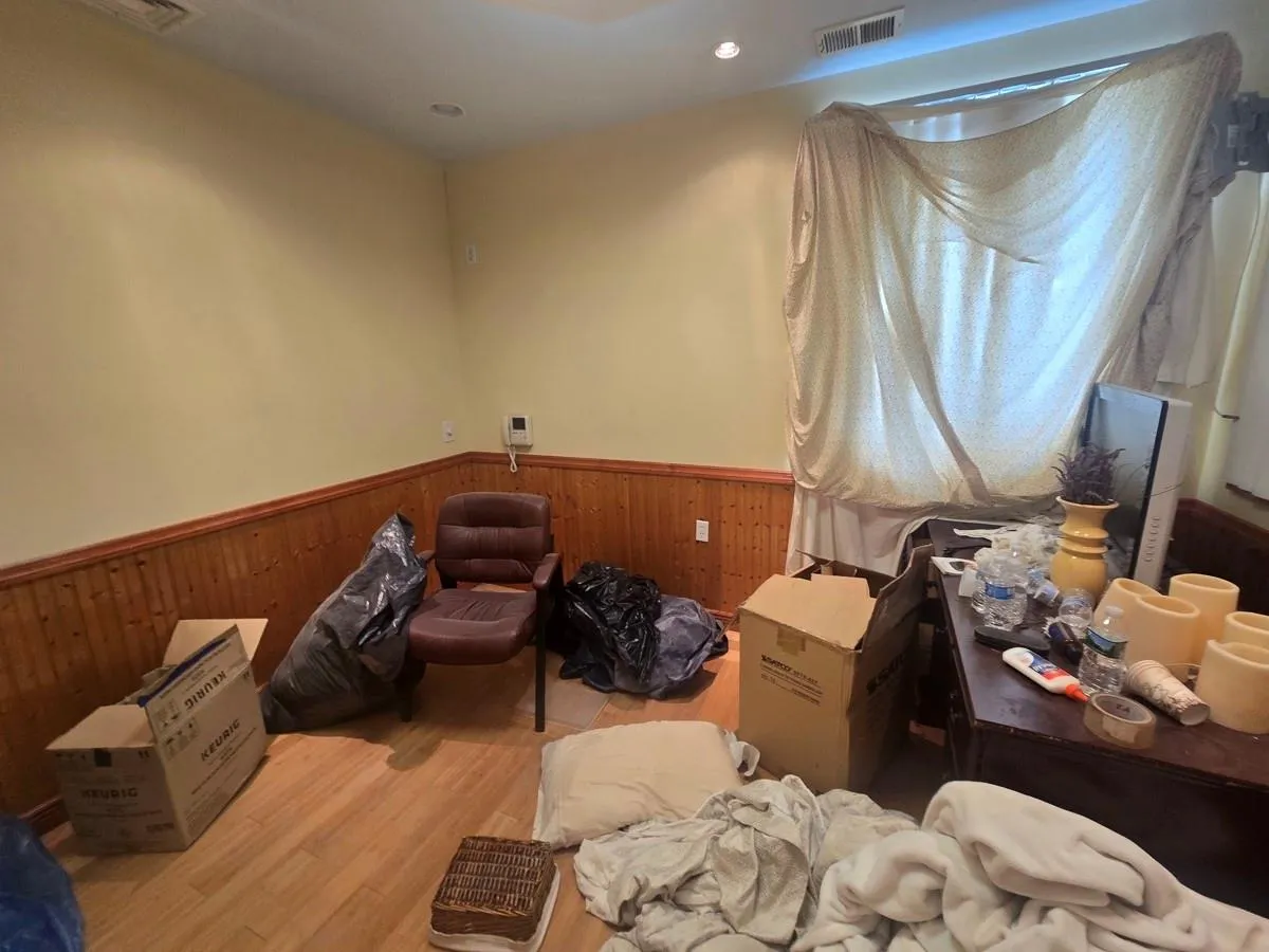 Living area with a wainscoted wall, wooden walls, wood finished floors, and recessed lighting Living area with a wainscoted wall, wooden walls, wood finished floors, and recessed lighting