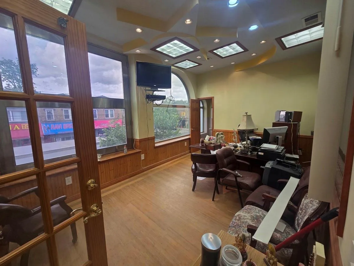 Office with a wainscoted wall, wood finished floors, recessed lighting, and wood walls Office with a wainscoted wall, wood finished floors, recessed lighting, and wood walls