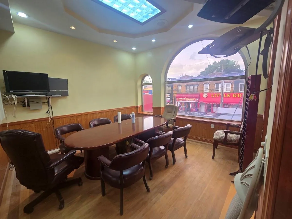 Dining room featuring wainscoting, wood finished floors, recessed lighting, and wood walls Dining room featuring wainscoting, wood finished floors, recessed lighting, and wood walls