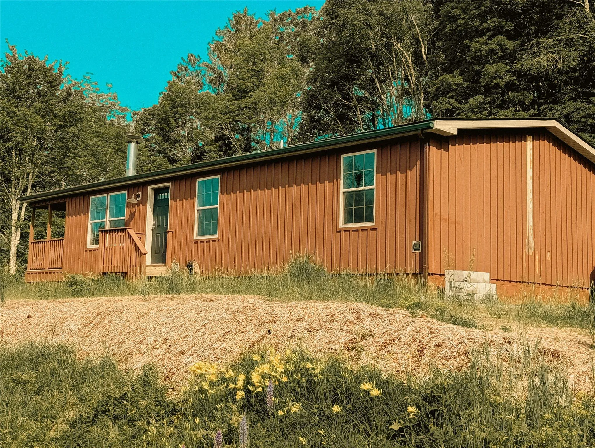 View of front facade with board and batten siding View of front facade with board and batten siding