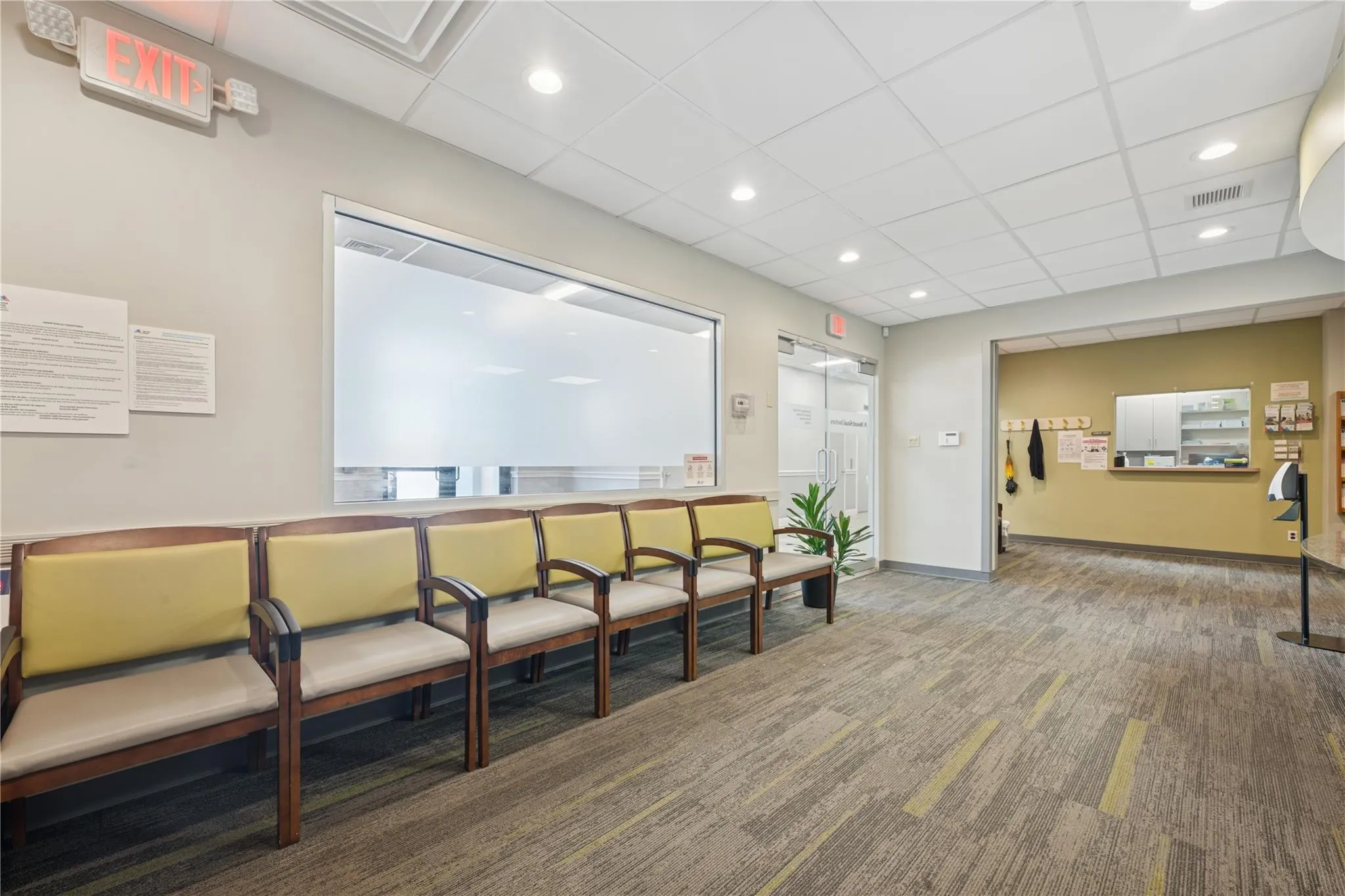 Community lobby featuring a paneled ceiling and recessed lighting Community lobby featuring a paneled ceiling and recessed lighting