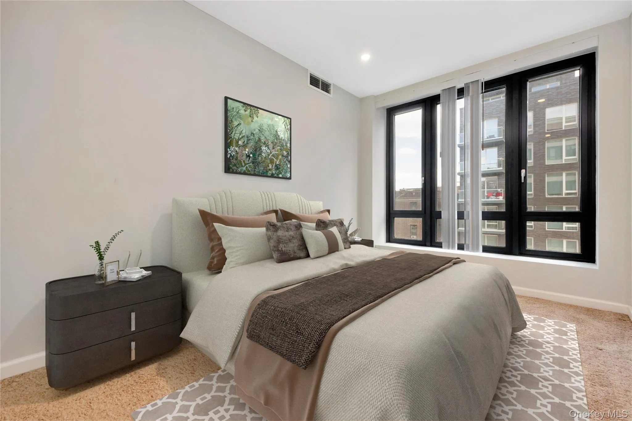 Carpeted bedroom featuring visible vents, baseboards, and recessed lighting Carpeted bedroom featuring visible vents, baseboards, and recessed lighting