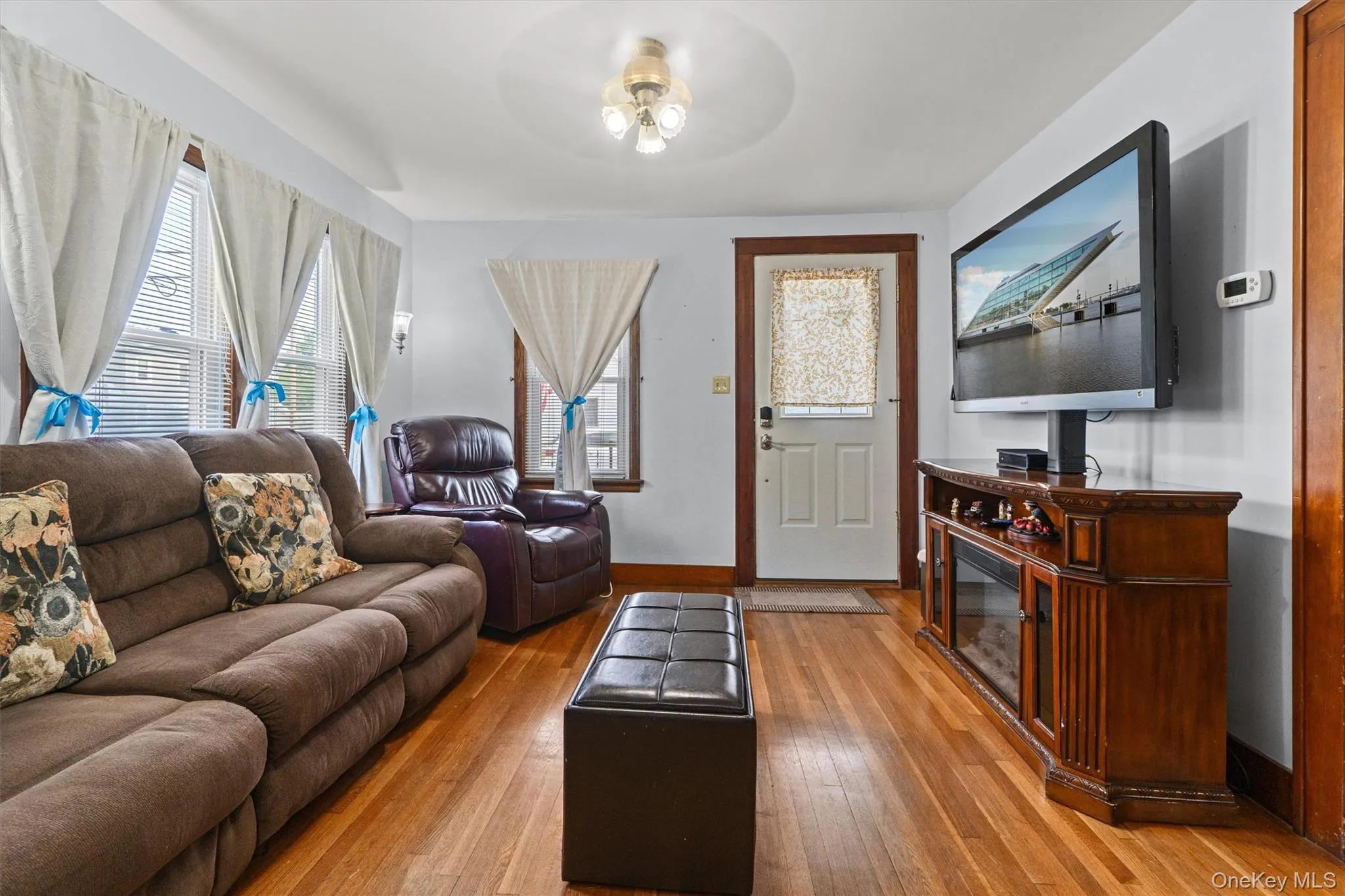 Living room with hardwood floors. Living room with hardwood floors.