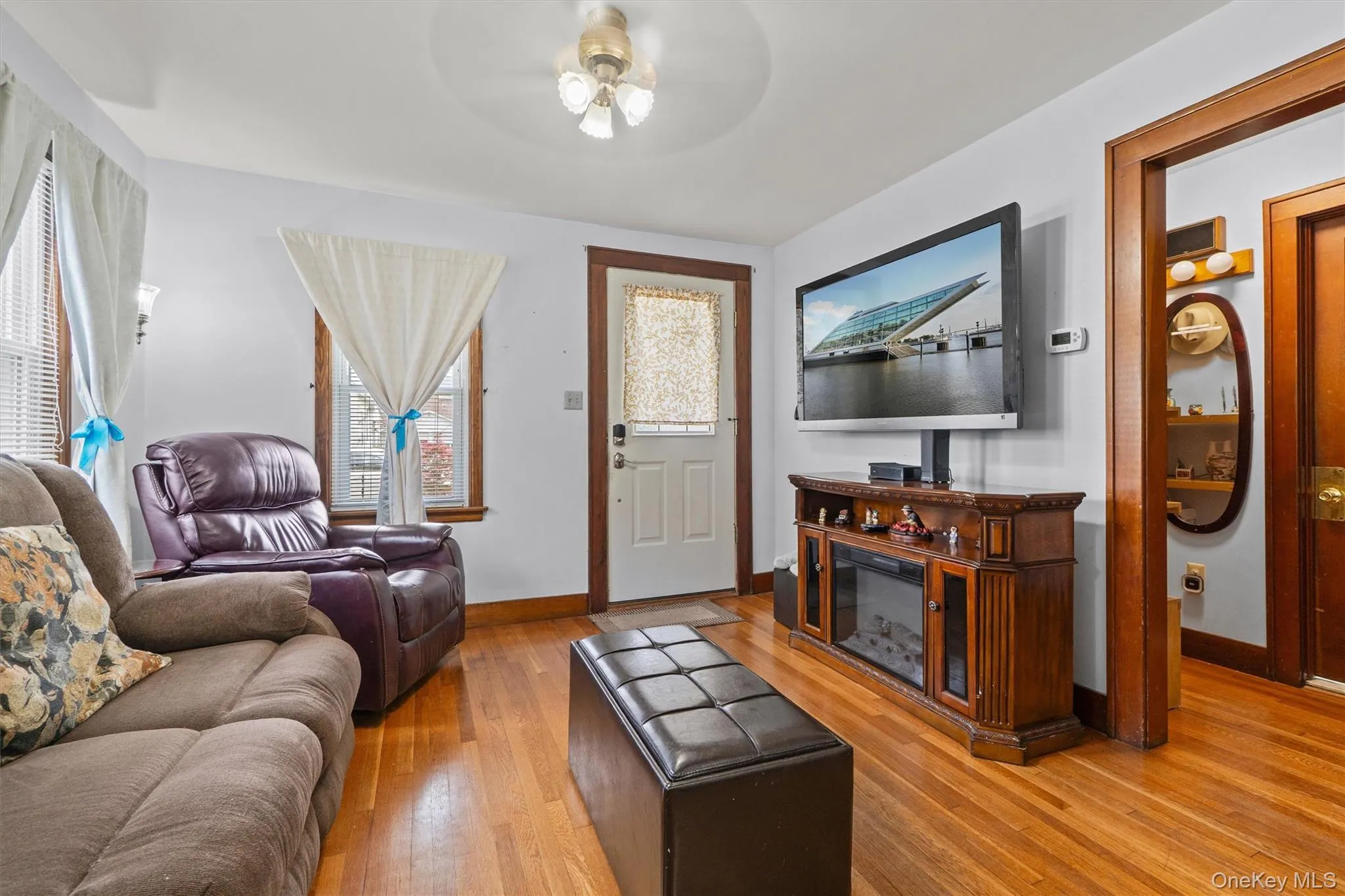Living room with hardwood floors. Living room with hardwood floors.