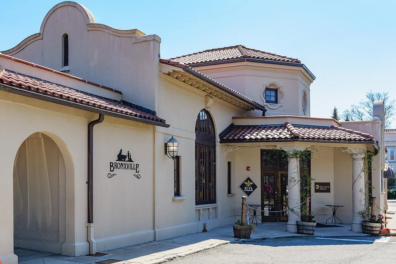 Mediterranean / spanish house with a tile roof, stucco siding, and covered porch Mediterranean / spanish house with a tile roof, stucco siding, and covered porch