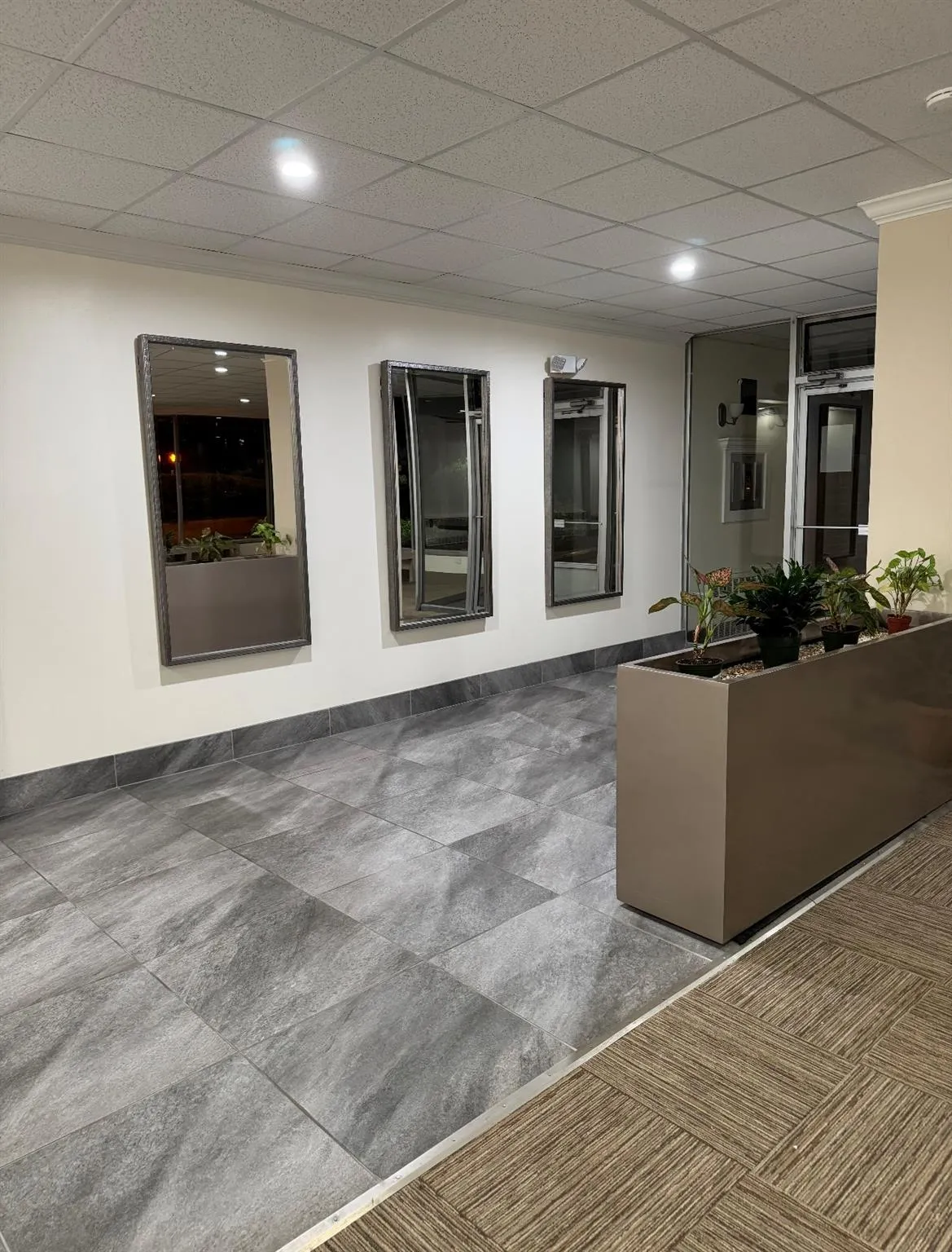 Building lobby with recessed lighting Building lobby with recessed lighting