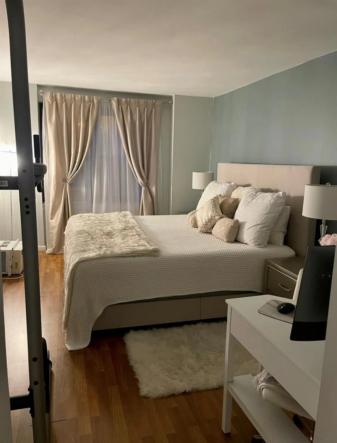 Bedroom with wood finished floors Bedroom with wood finished floors