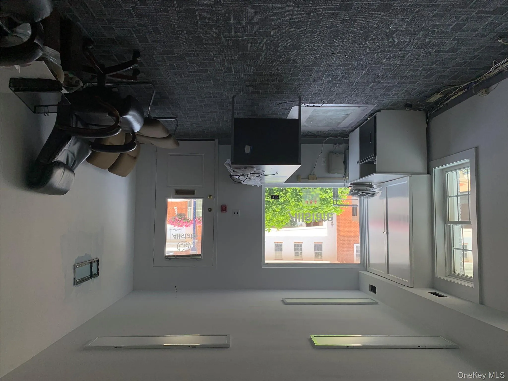 Office area with carpet flooring Office area with carpet flooring