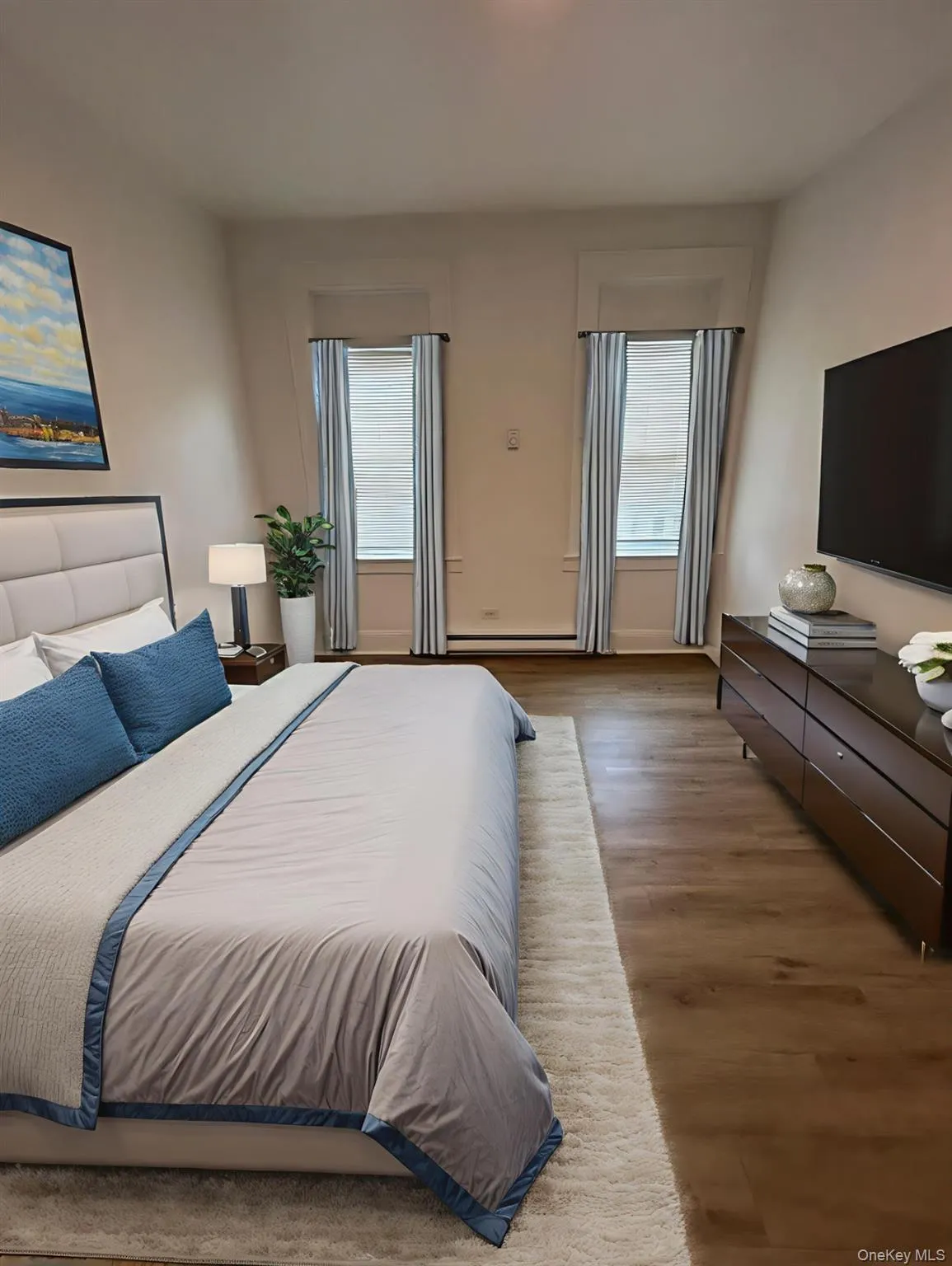 Bedroom featuring light wood-type flooring Bedroom featuring light wood-type flooring