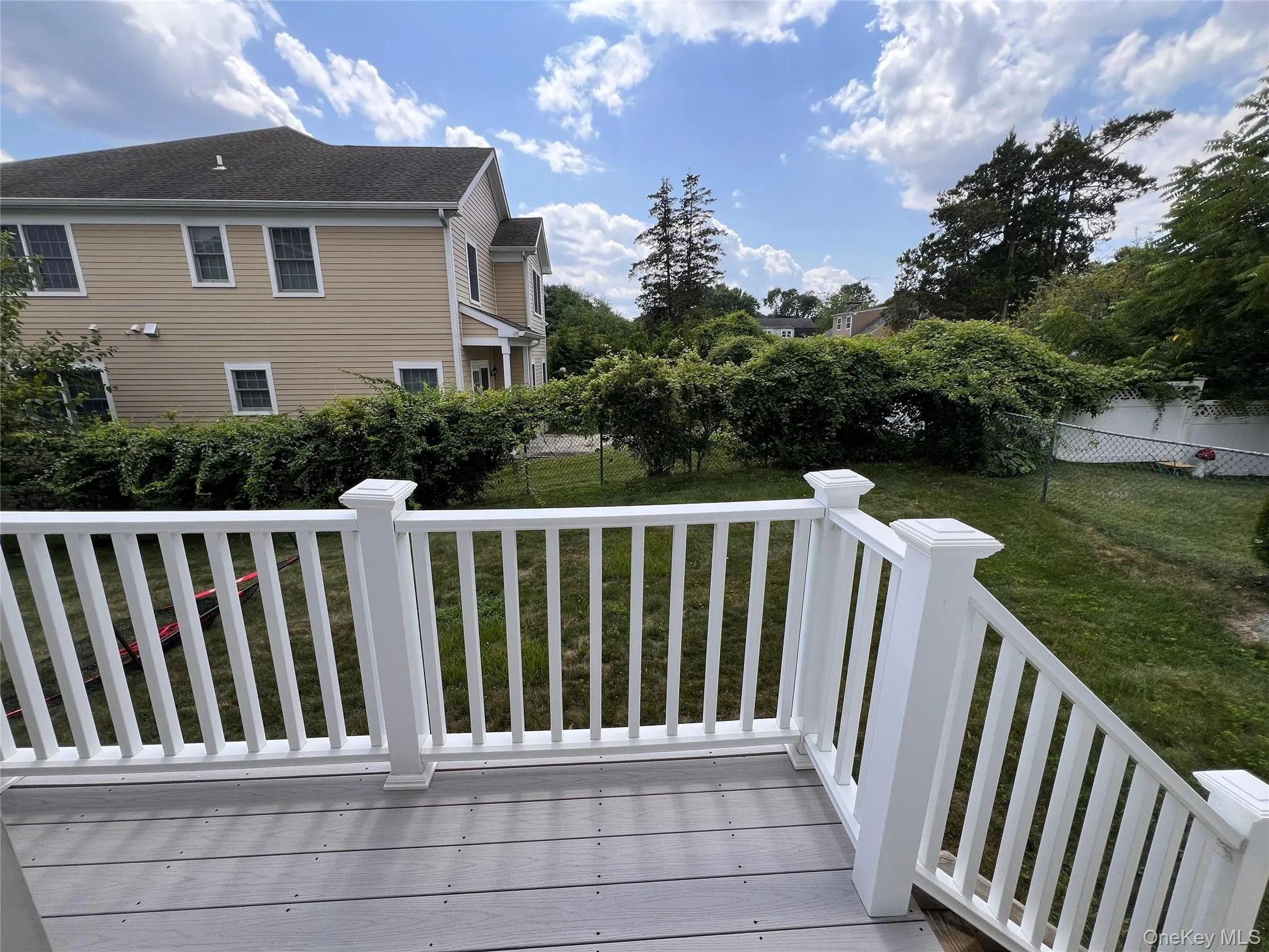View of deck and backyard View of deck and backyard