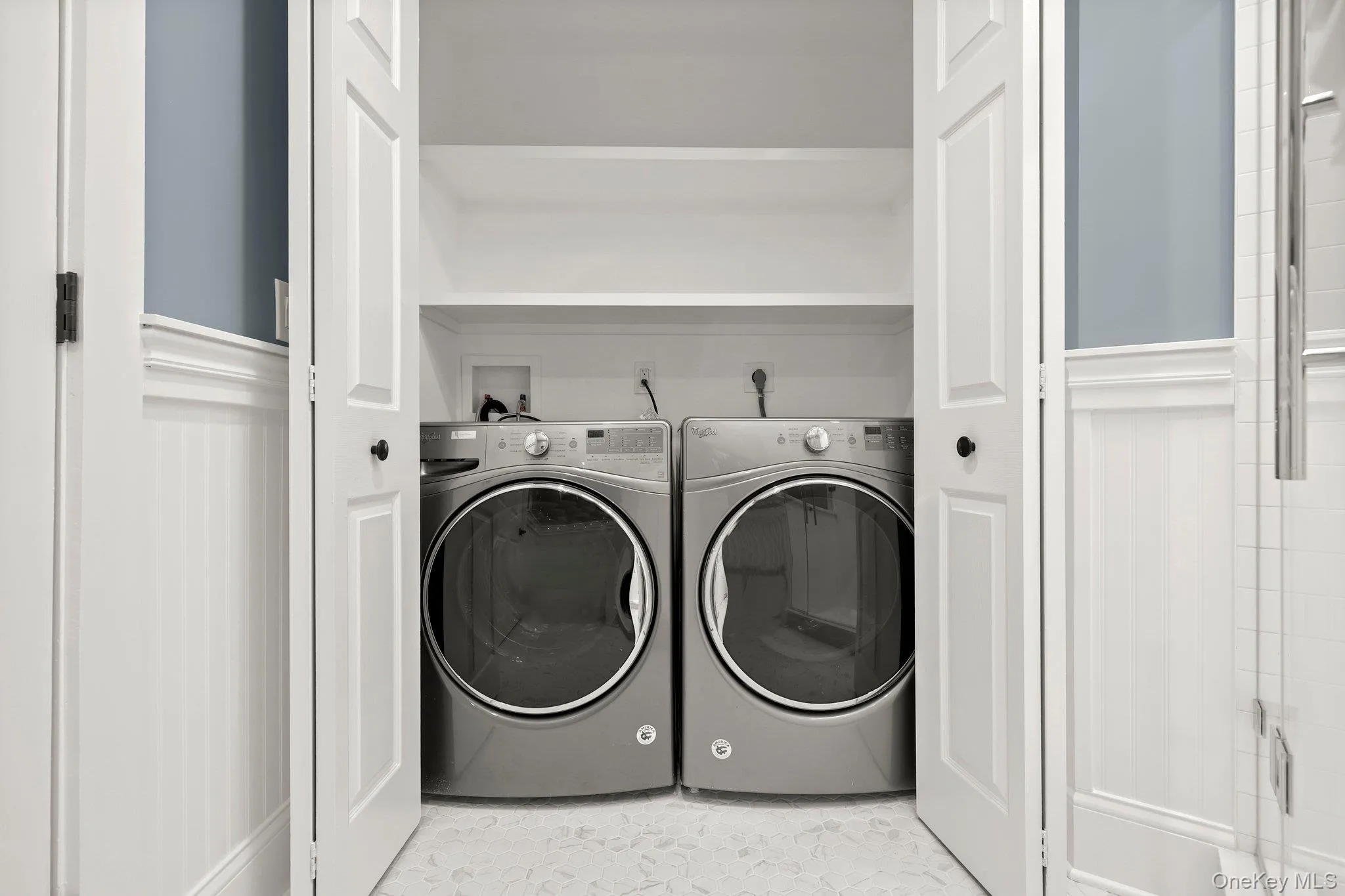 Washroom with washing machine and dryer Washroom with washing machine and dryer