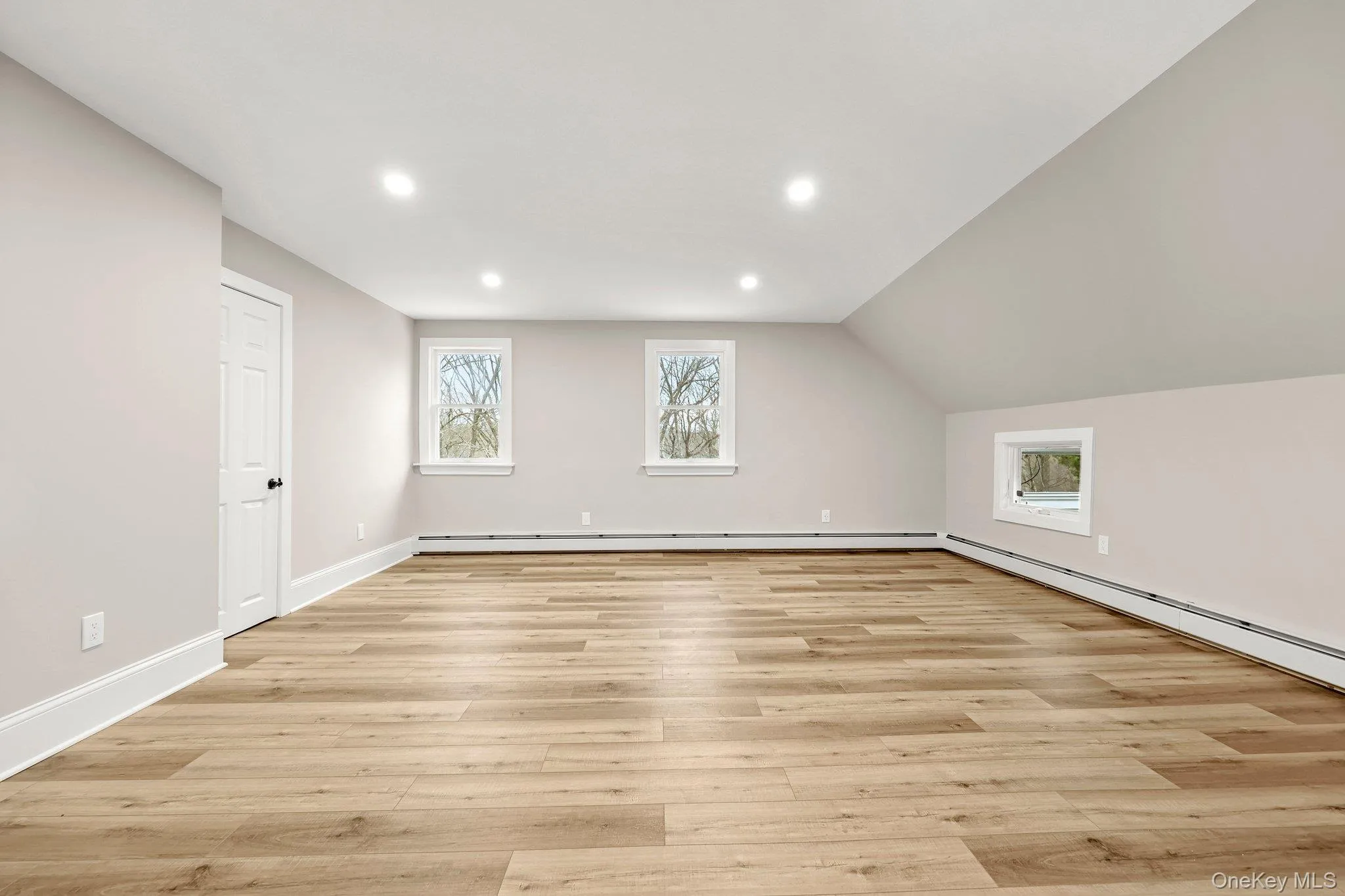 bedroom with recessed lighting,  lofted ceiling bedroom with recessed lighting,  lofted ceiling