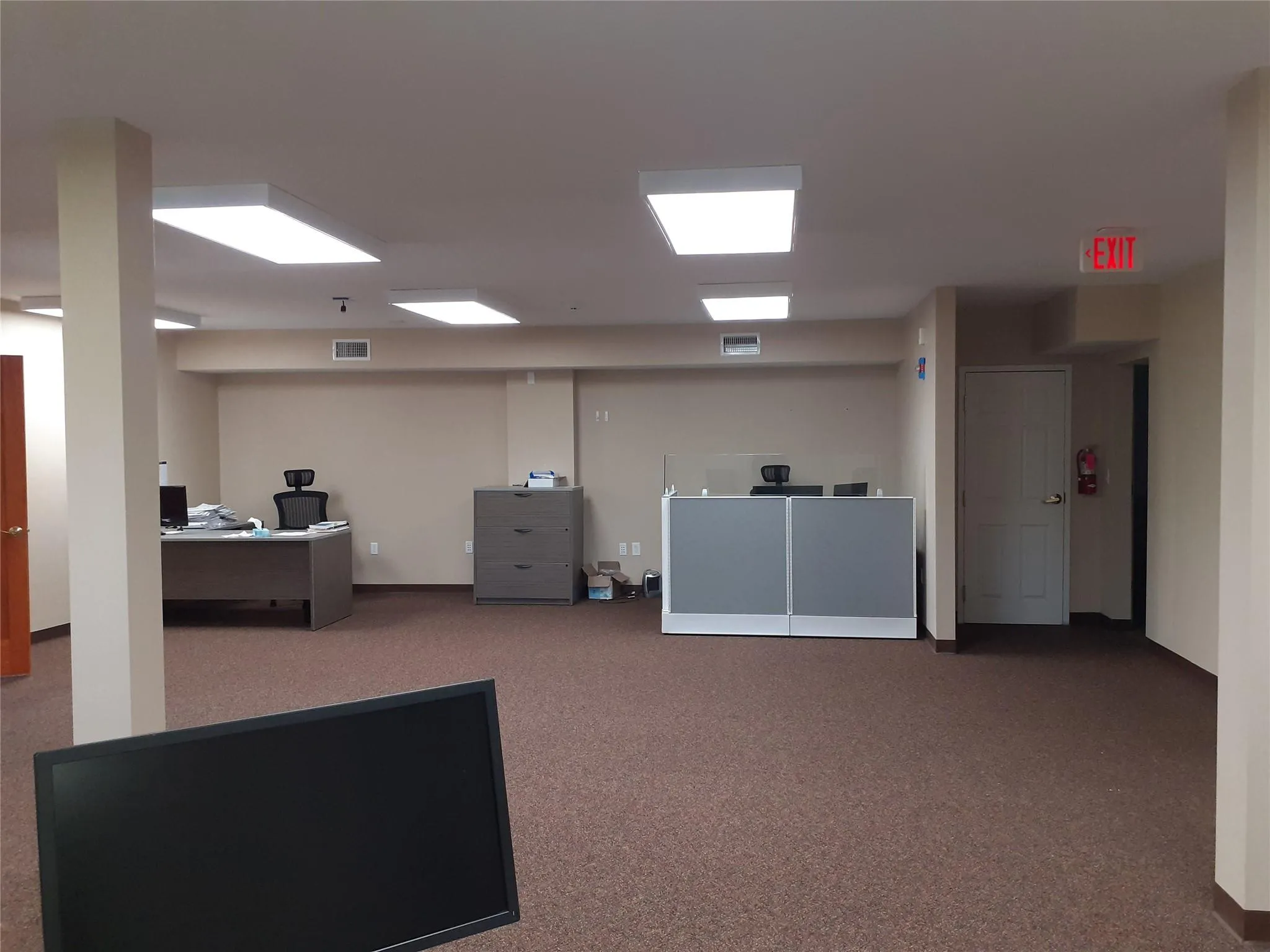 Office with carpet floors Office with carpet floors