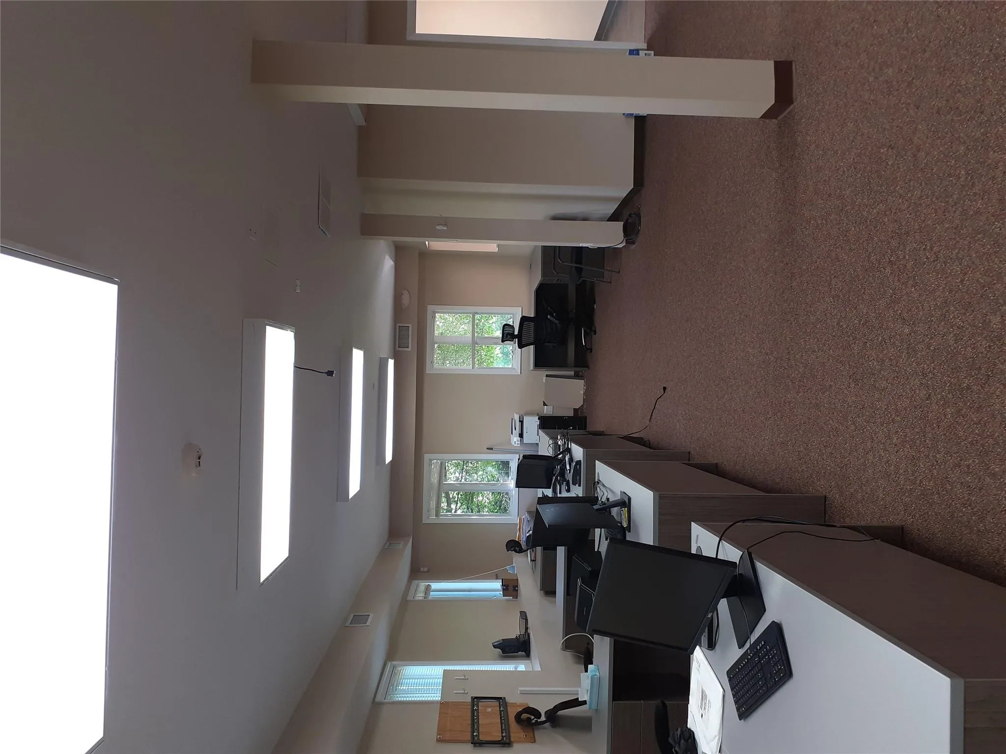 Office area with light colored carpet Office area with light colored carpet