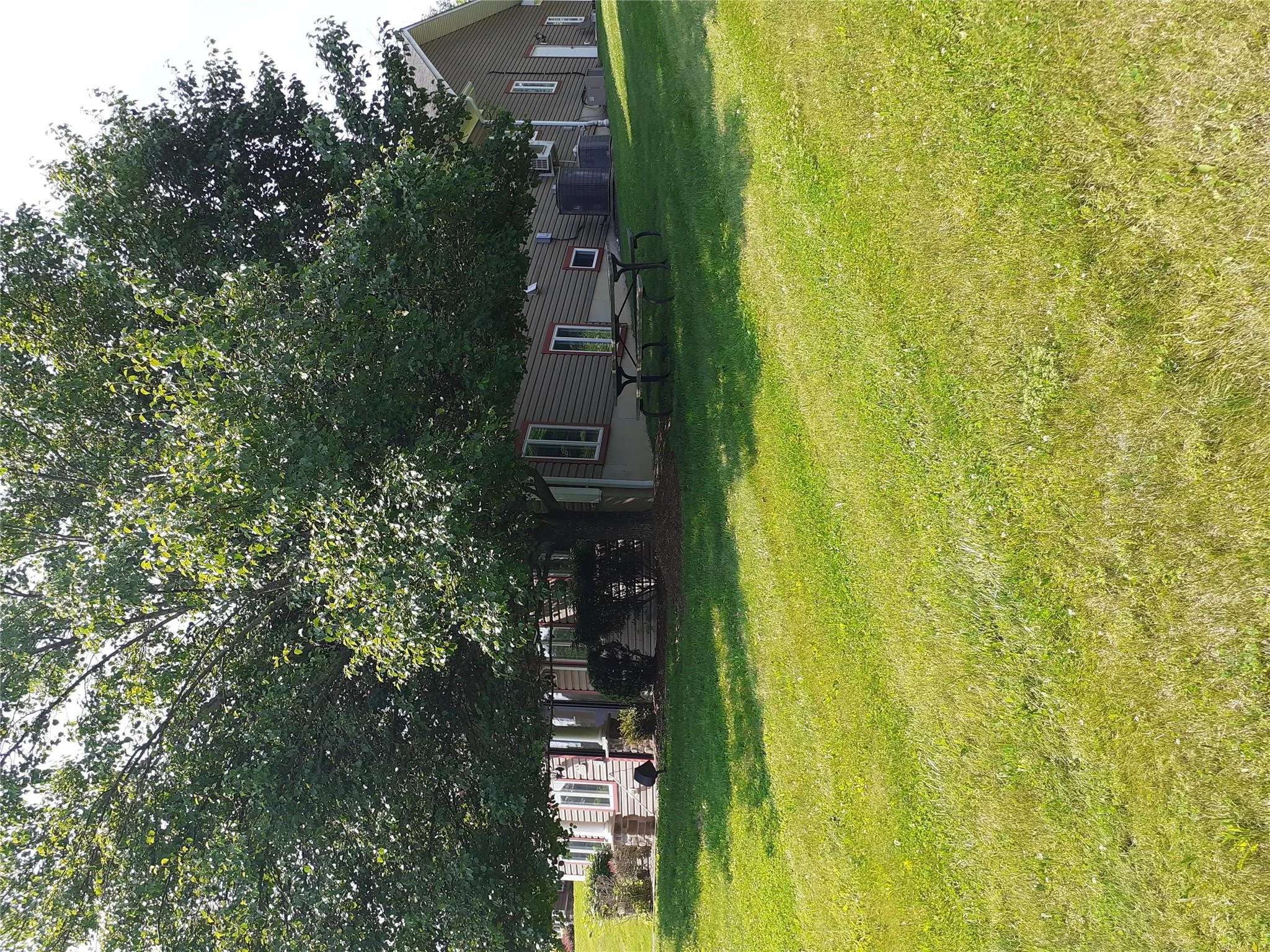 View of green lawn with central AC View of green lawn with central AC