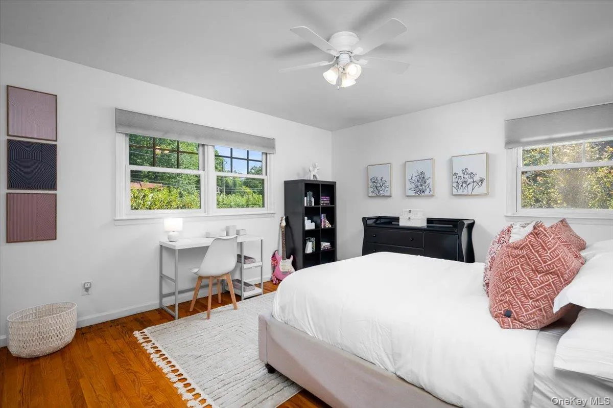 A well-sized bedroom with hardwood floors, two exposures and room for both sleeping and work or study areas. A well-sized bedroom with hardwood floors, two exposures and room for both sleeping and work or study areas.