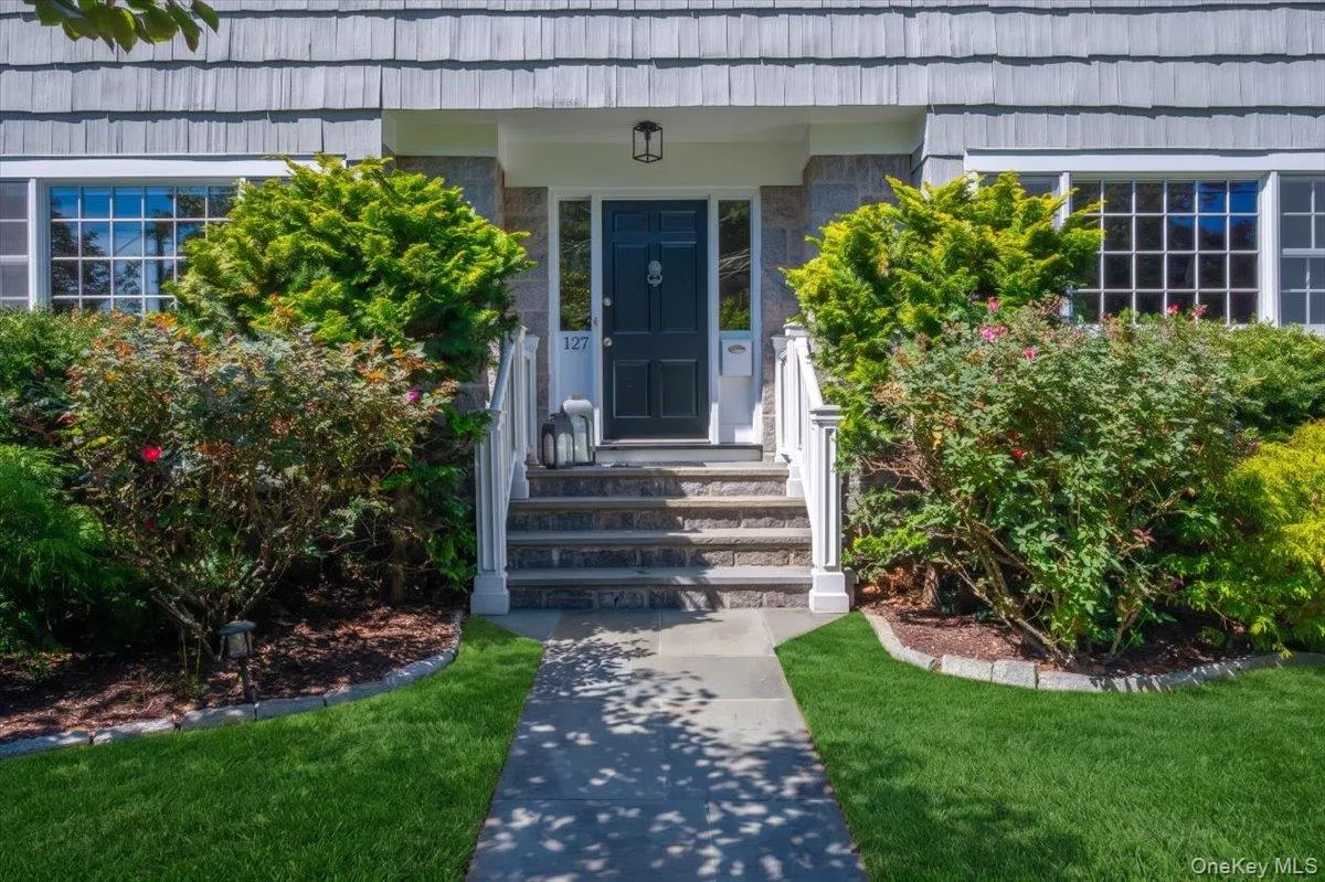 A classic Colonial silhouette, generous windows and established landscaping create timeless curb appeal in an exceptionally convenient Pelham location. A classic Colonial silhouette, generous windows and established landscaping create timeless curb appeal in an exceptionally convenient Pelham location.
