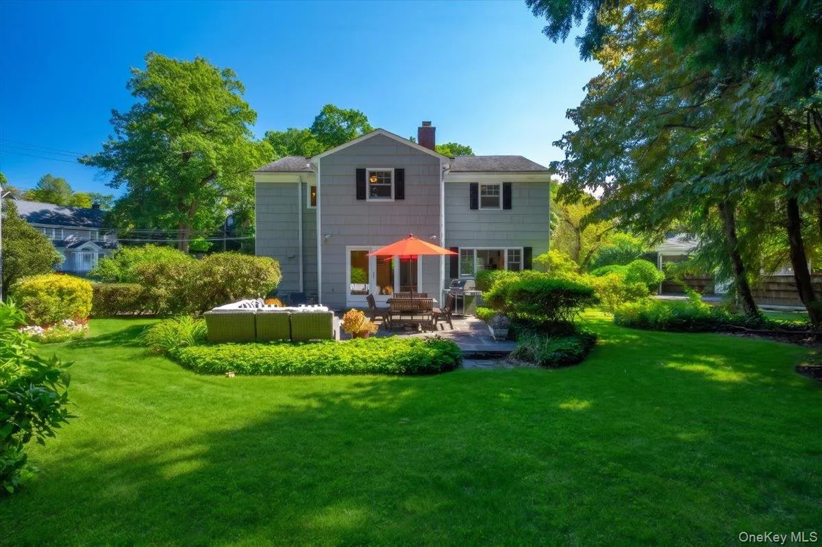 The rear of the home opens directly to the patio and broad backyard, highlighting one of the property’s defining strengths: easy indoor/outdoor living. The rear of the home opens directly to the patio and broad backyard, highlighting one of the property’s defining strengths: easy indoor/outdoor living.