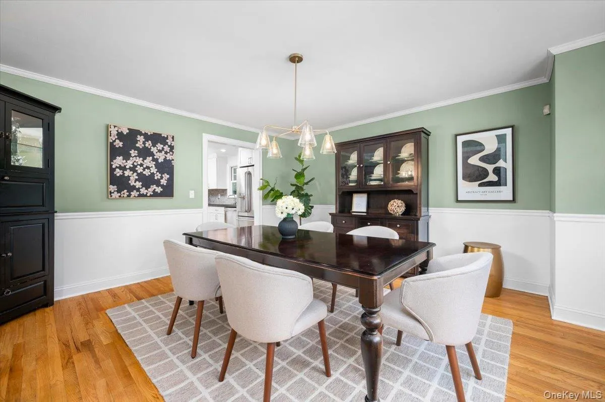 Generous dimensions allow for a substantial dining table and storage pieces, with direct access to the renovated kitchen for an easy entertaining flow. Generous dimensions allow for a substantial dining table and storage pieces, with direct access to the renovated kitchen for an easy entertaining flow.