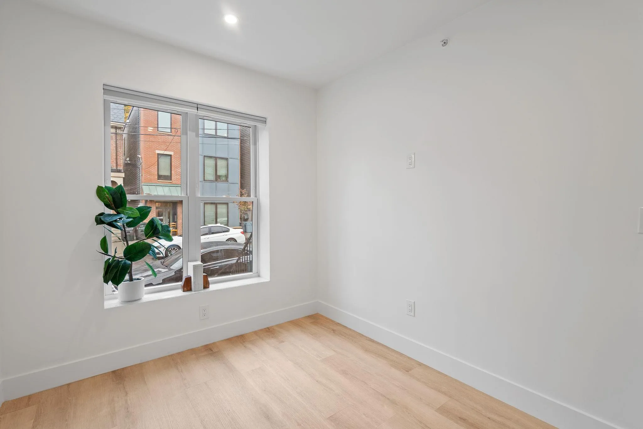 Empty room with light hardwood / wood-style flooring Empty room with light hardwood / wood-style flooring