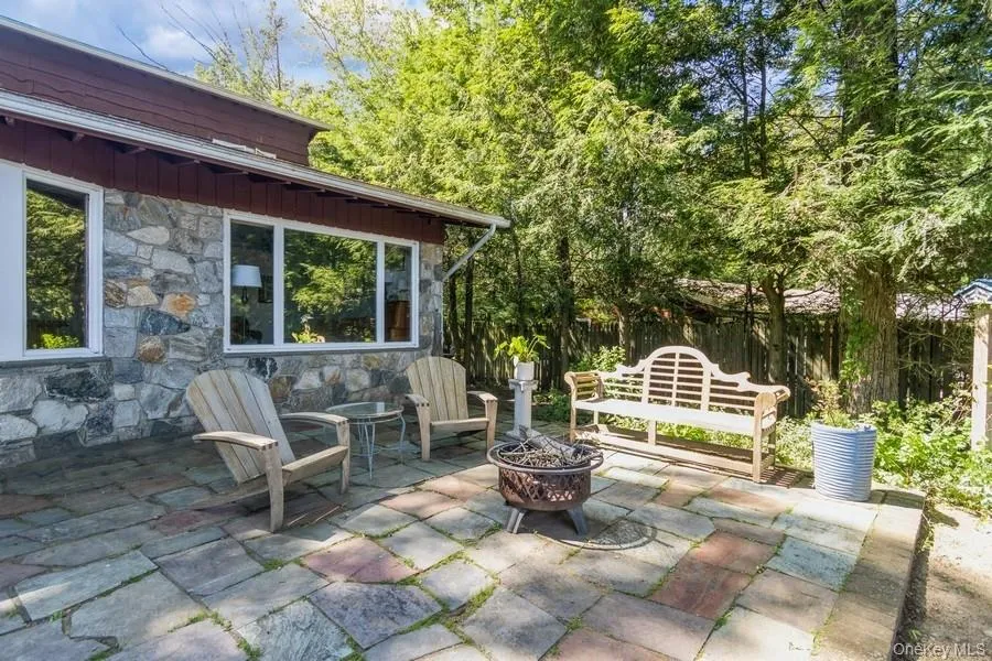 View of patio / terrace with a fire pit View of patio / terrace with a fire pit