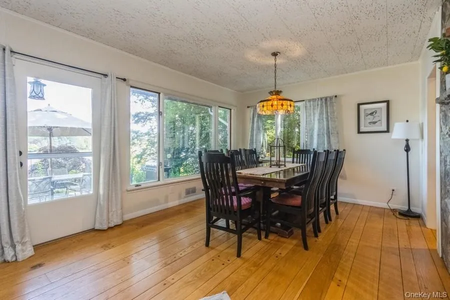 Dining area featuring light wood flooring Dining area featuring light wood flooring
