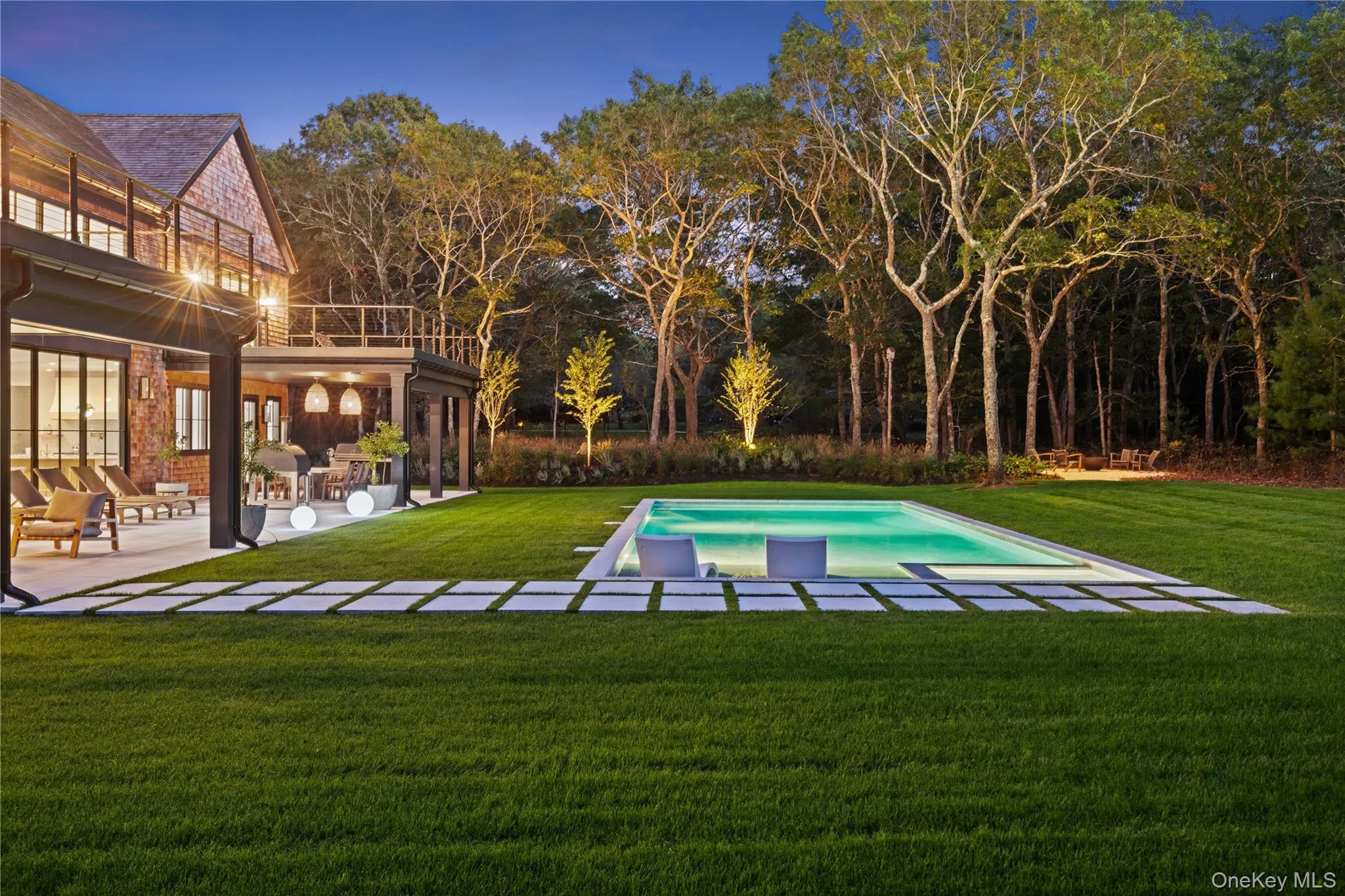 Outdoor pool featuring a patio and a lawn Outdoor pool featuring a patio and a lawn