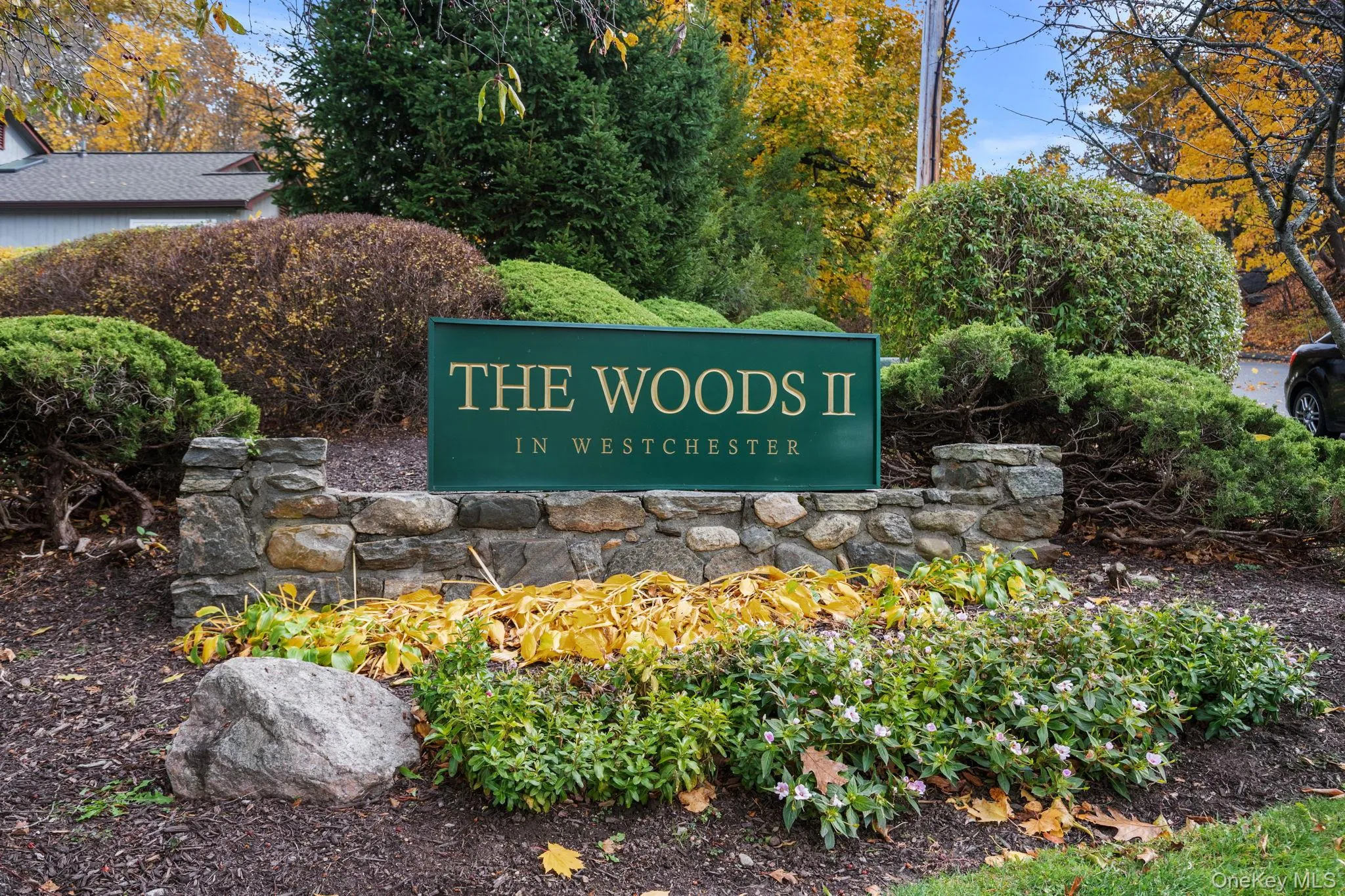 Charming stonework and lush landscaping create a warm welcome to the sought-after Woods II condominium complex in Yorktown Heights. Charming stonework and lush landscaping create a warm welcome to the sought-after Woods II condominium complex in Yorktown Heights.