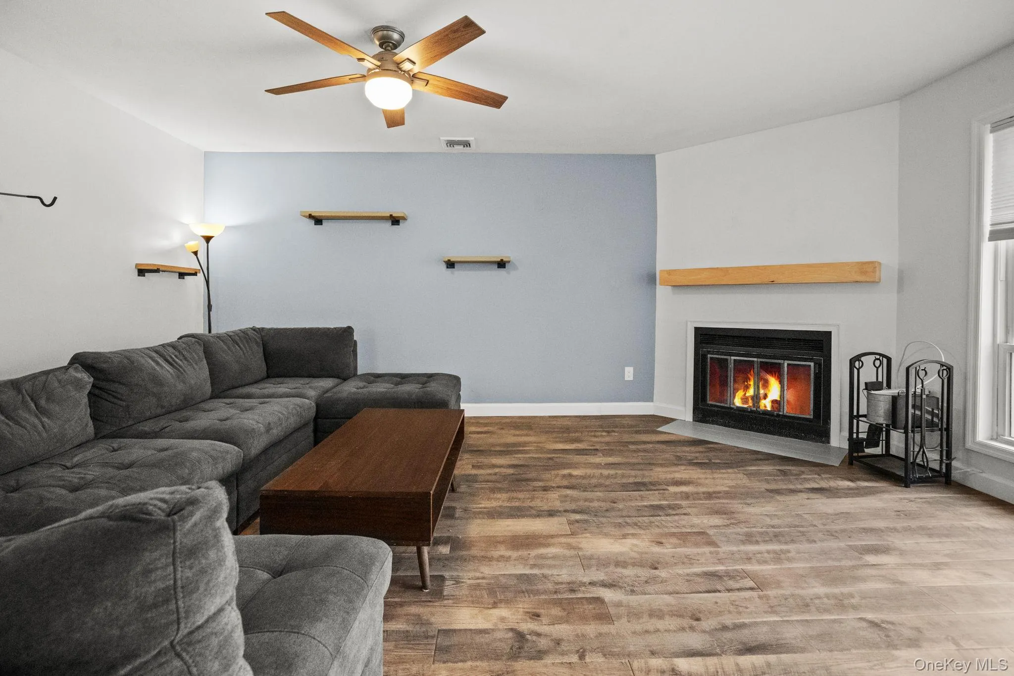 Warm tones and a cozy layout make this living space perfect for relaxing or entertaining. Warm tones and a cozy layout make this living space perfect for relaxing or entertaining.