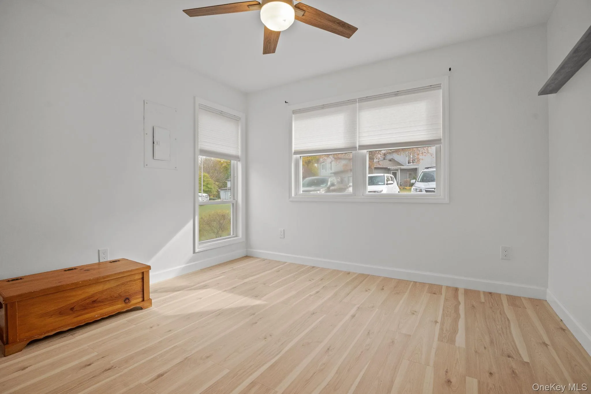 The bright bonus room offers flexible space perfect for a guest room, home office, or cozy den with fresh flooring and natural light. The bright bonus room offers flexible space perfect for a guest room, home office, or cozy den with fresh flooring and natural light.