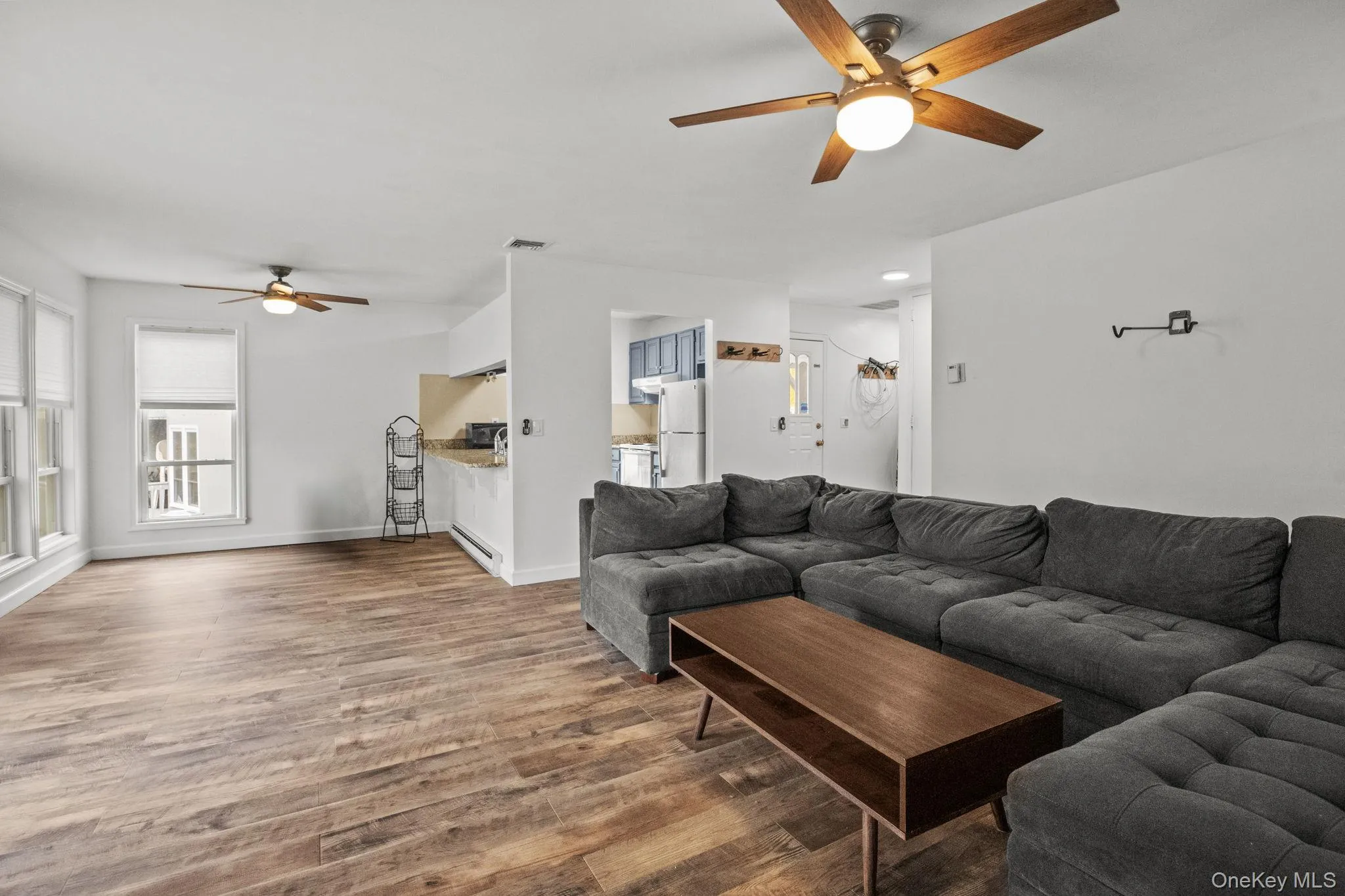 Expansive windows and neutral finishes create a bright, welcoming atmosphere in the dining area. Expansive windows and neutral finishes create a bright, welcoming atmosphere in the dining area.