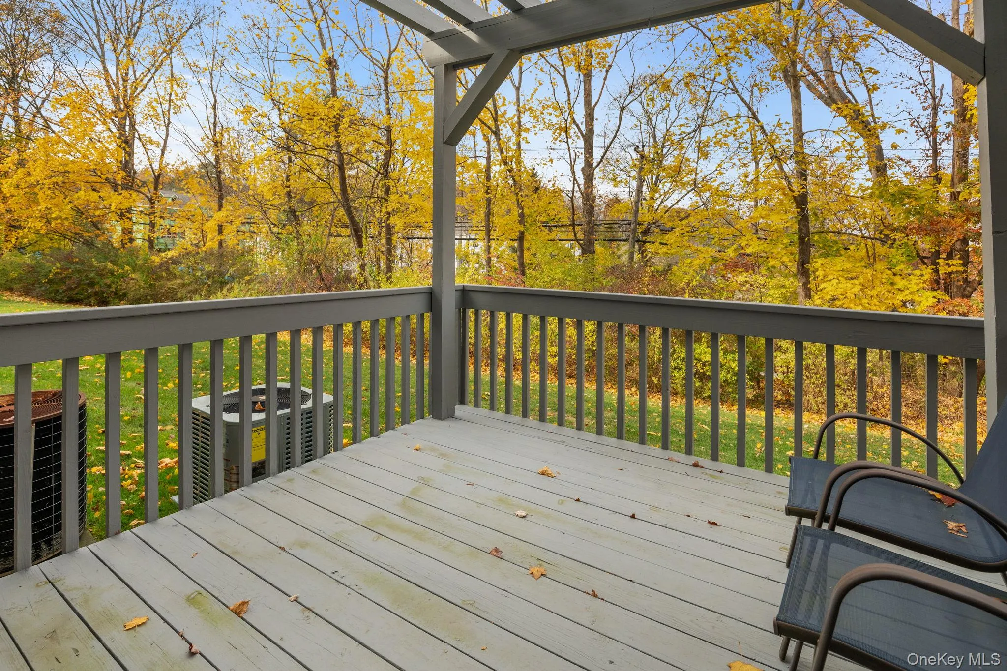 Enjoy peaceful wooded views from the private deck, perfect for relaxing or entertaining in the serene Woods II setting. Enjoy peaceful wooded views from the private deck, perfect for relaxing or entertaining in the serene Woods II setting.